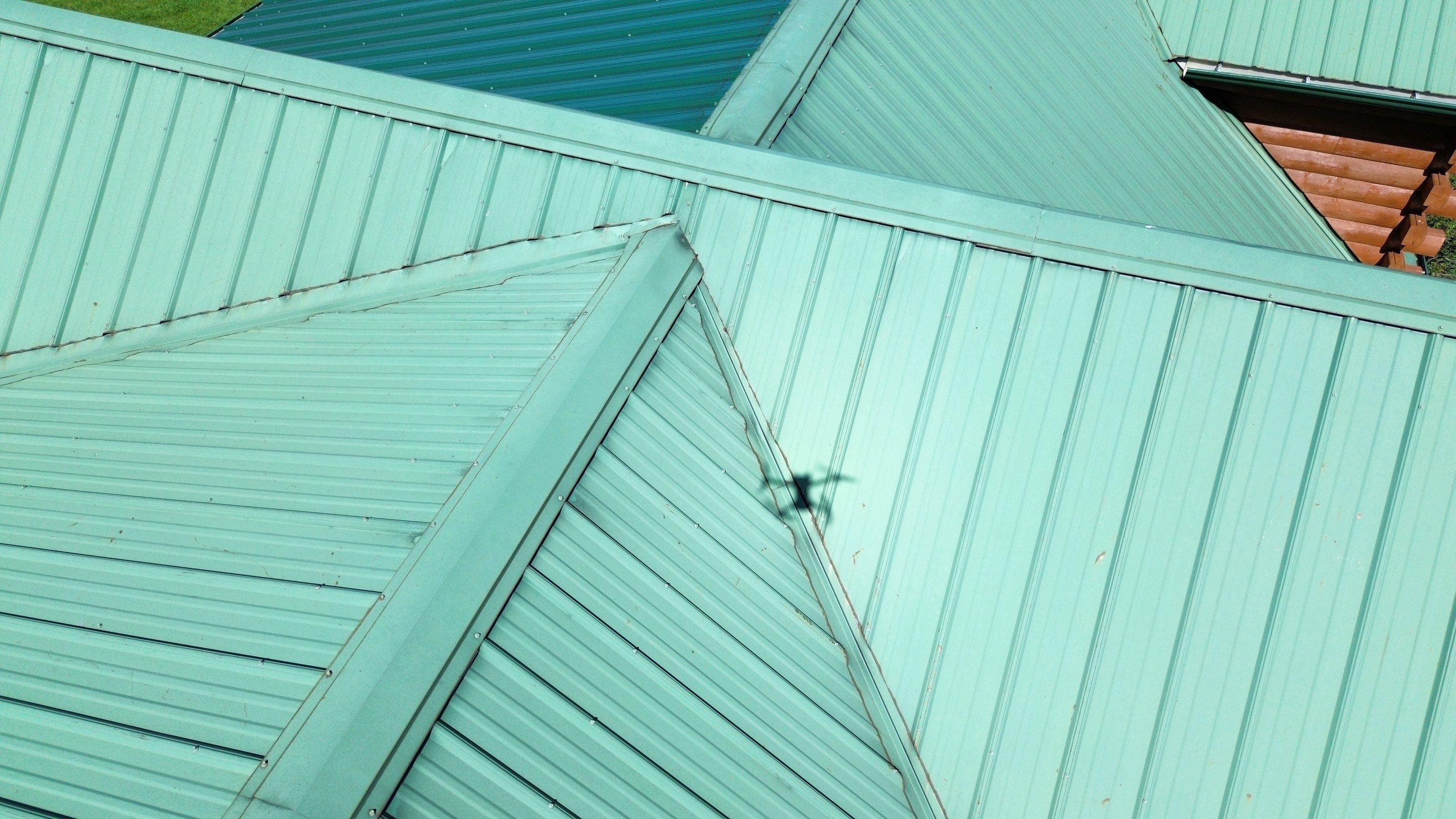 Residential Roofing Installation using Performance Panel Metal - Frost Black by RoofX 