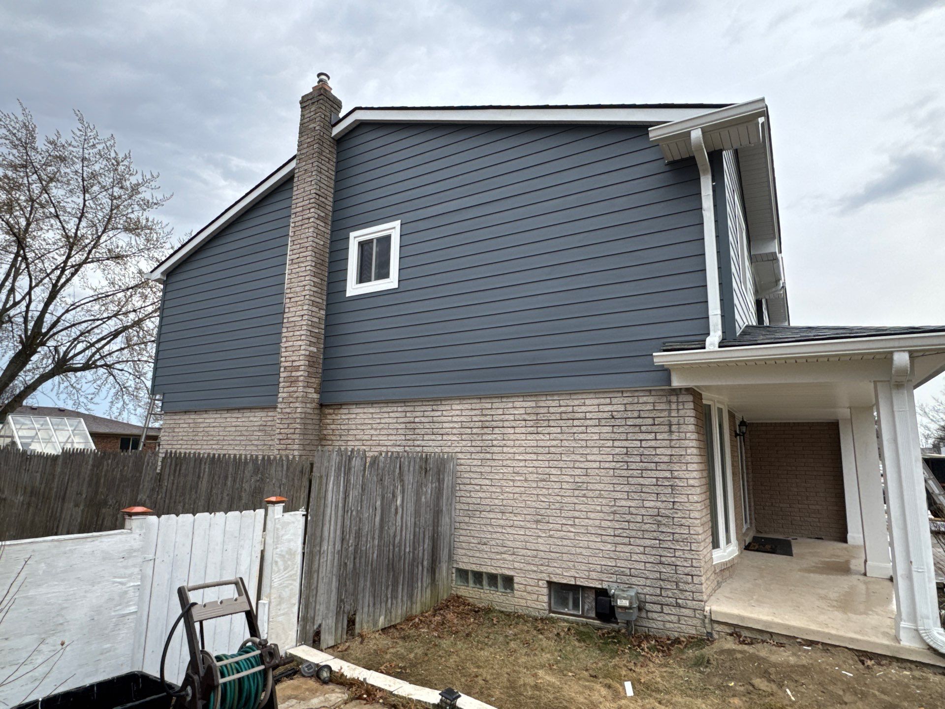 Siding Replacement using Alside Midnight Blue by 180 Contractors