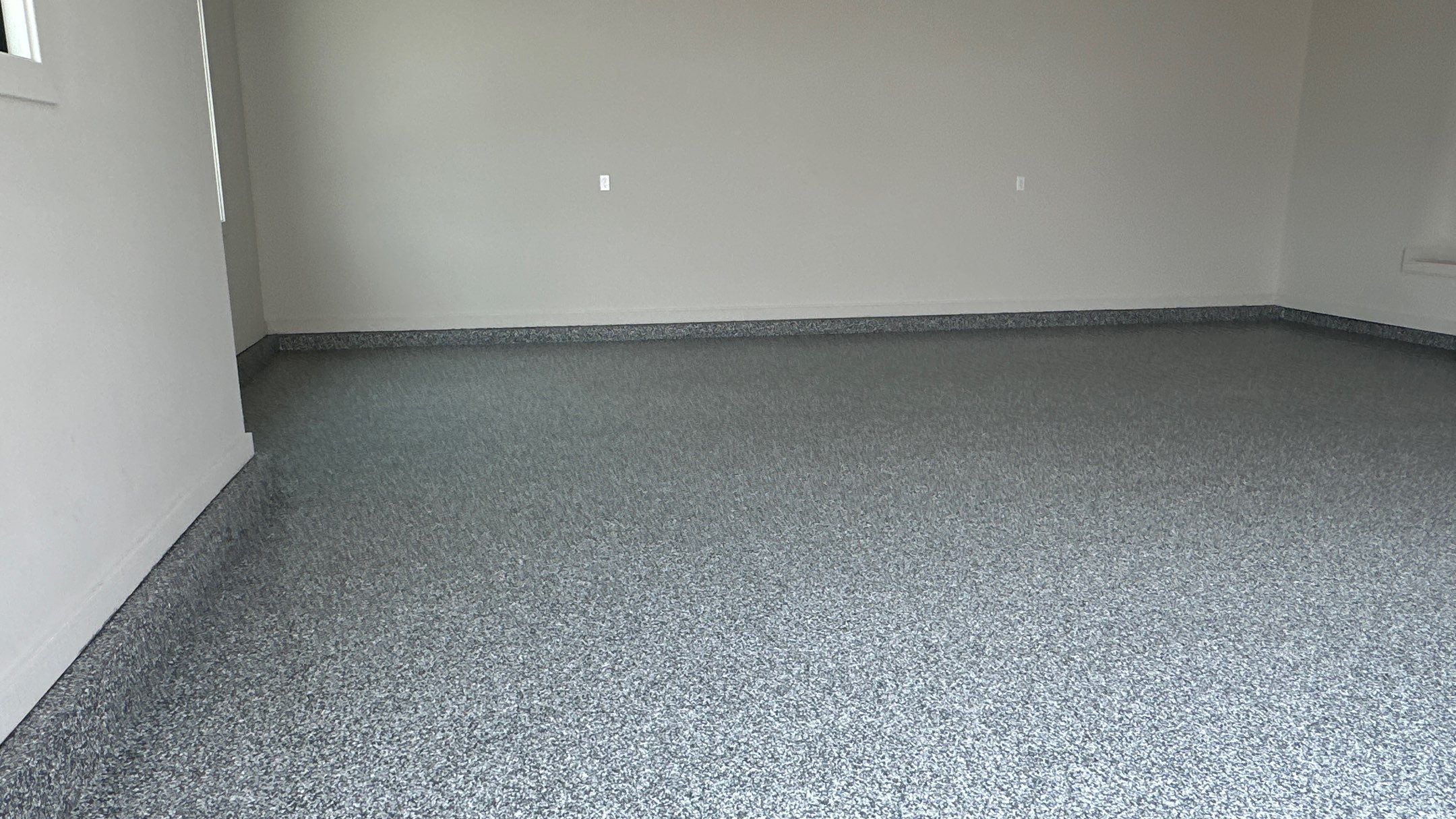 Check out how beautiful a brand new stonehenge flake floor looks by Banner Garage