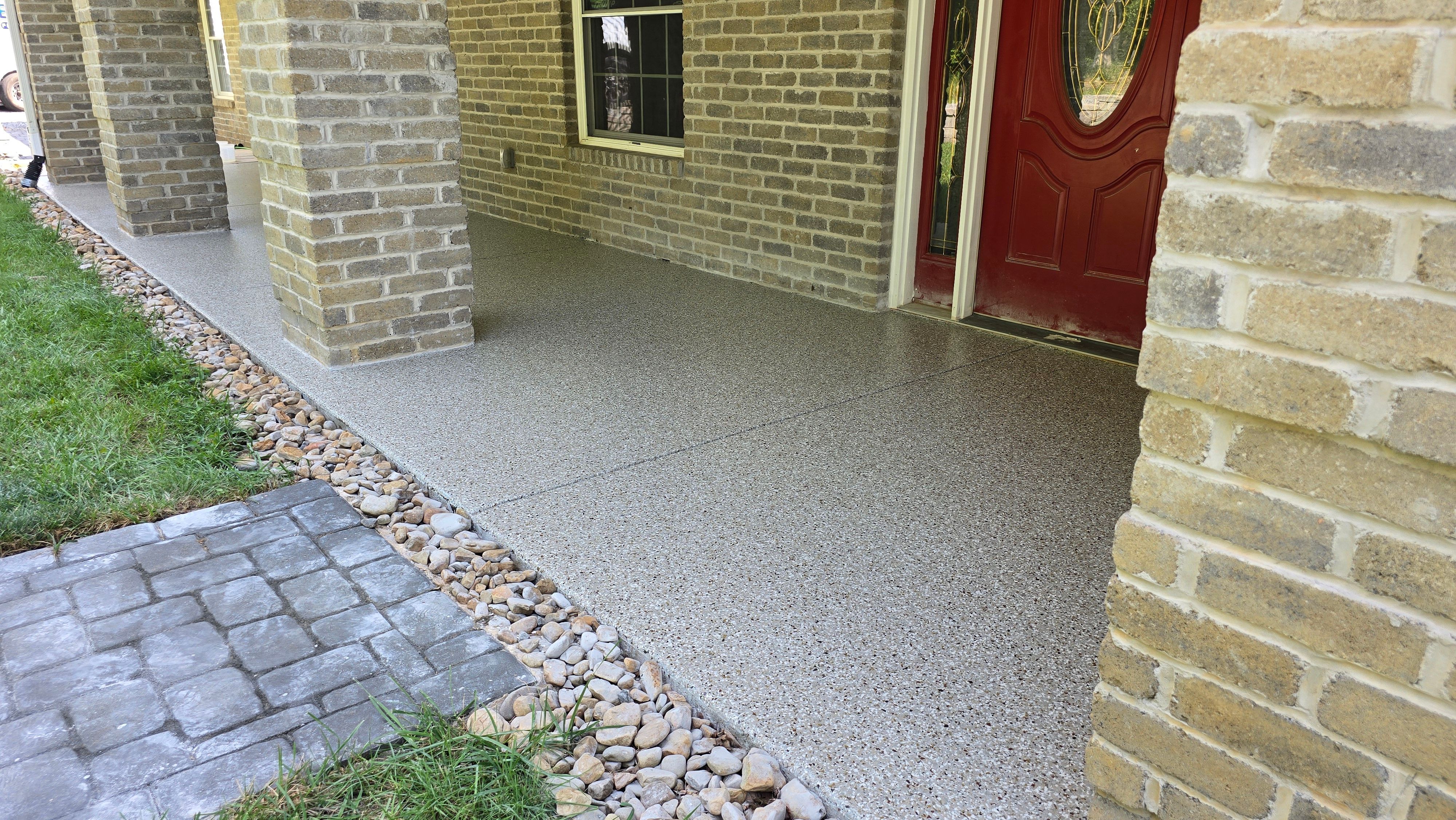 Back Patio using Creekbed by Elite Floor Solutions