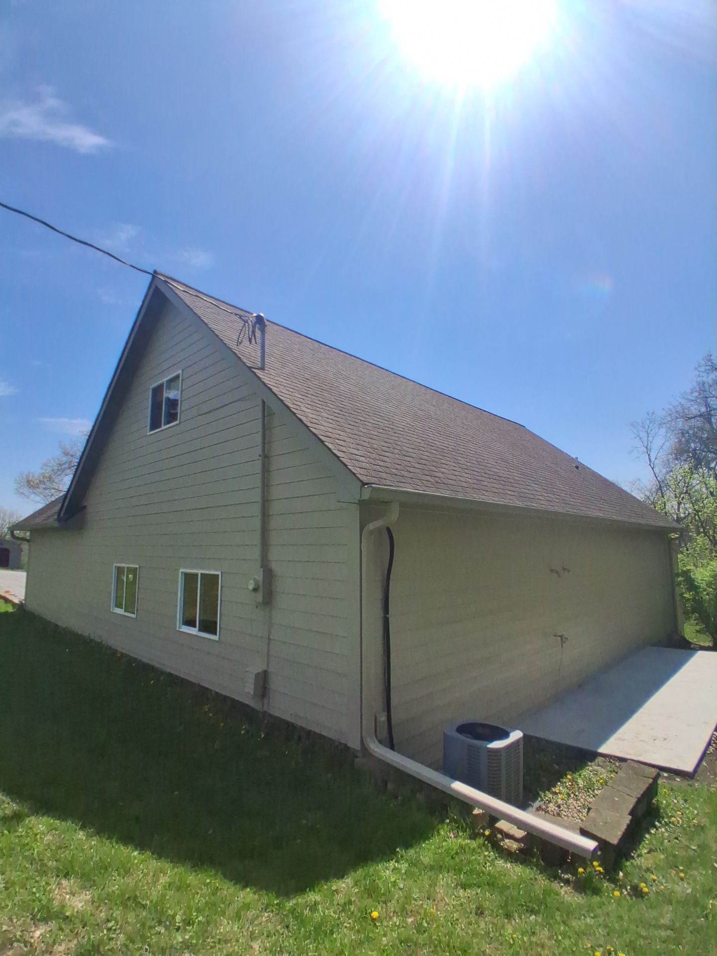 Residential Exterior Repaint Including Shop and Shed  by Midwest Paint LLC