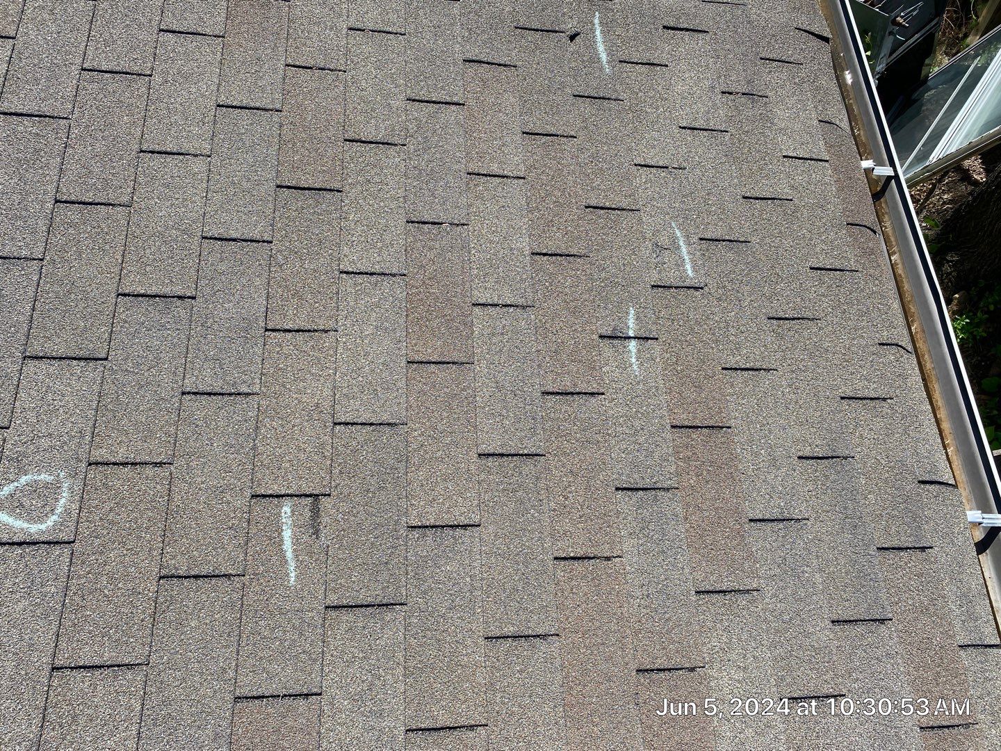 Roof inspection in Bartlesville by Decor Roofing & Restoration