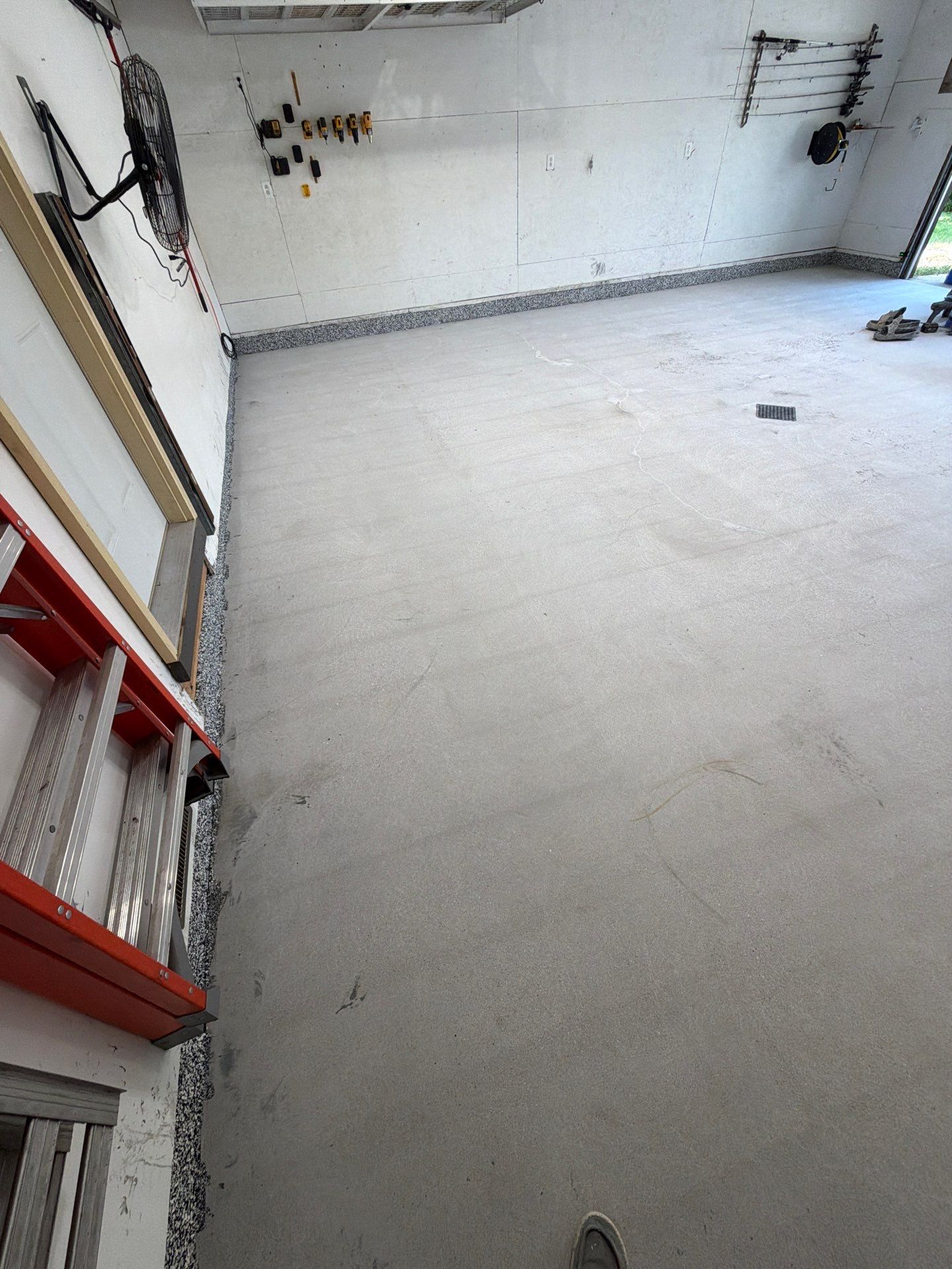 Custom Speckled Epoxy Garage Floor Coating in Fruitport, Michigan by Gordon Painting