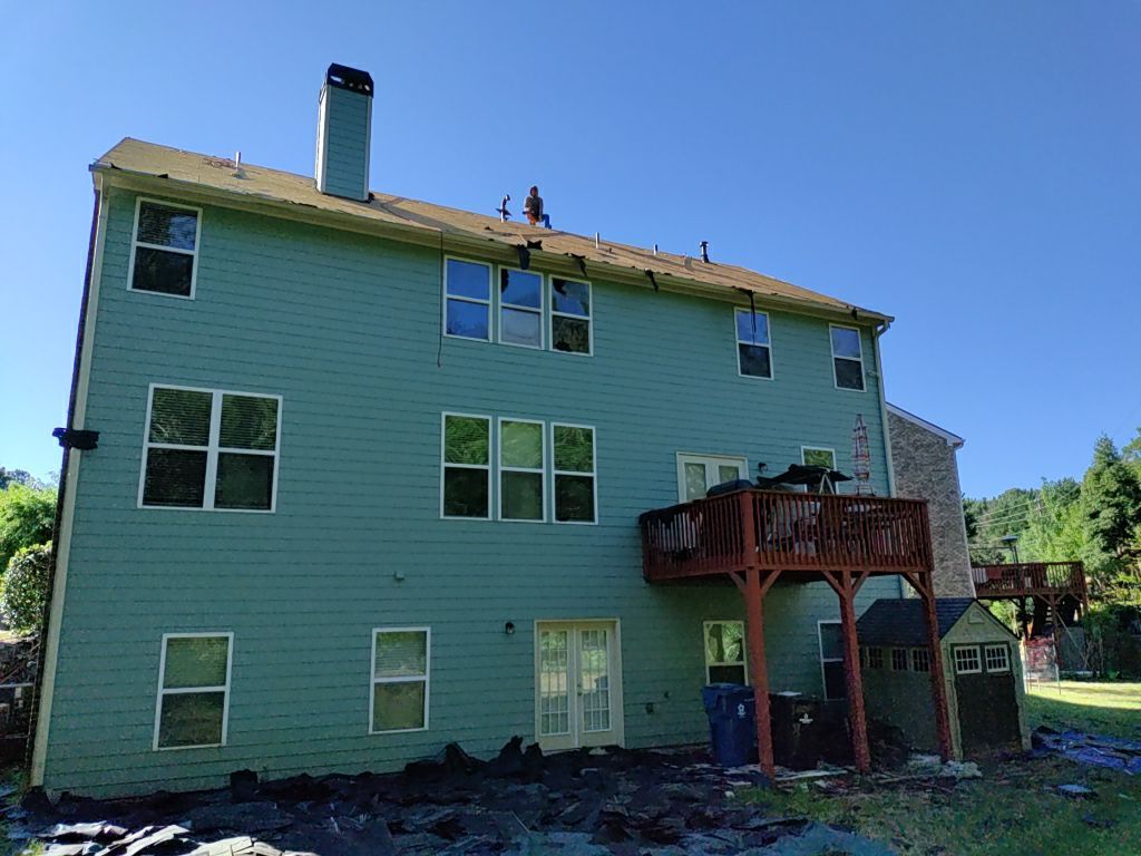 Residential Roofing Installation using Owens Corning Onyx Black by Inspector Roofing and Restoration