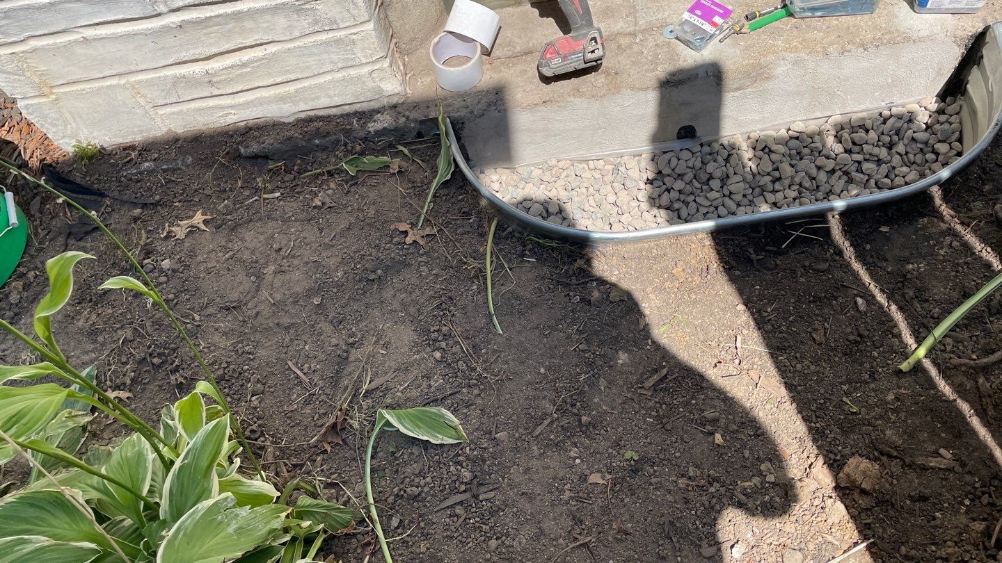 Drain Tile, Window Wells & Buried Discharge in Minneapolis by Waterproofing Northeast