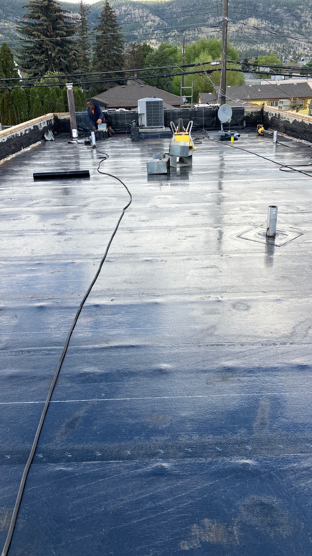 Commercial ReRoofing Installation using IKO 2ply sbs by Top Notch Roofing Inc