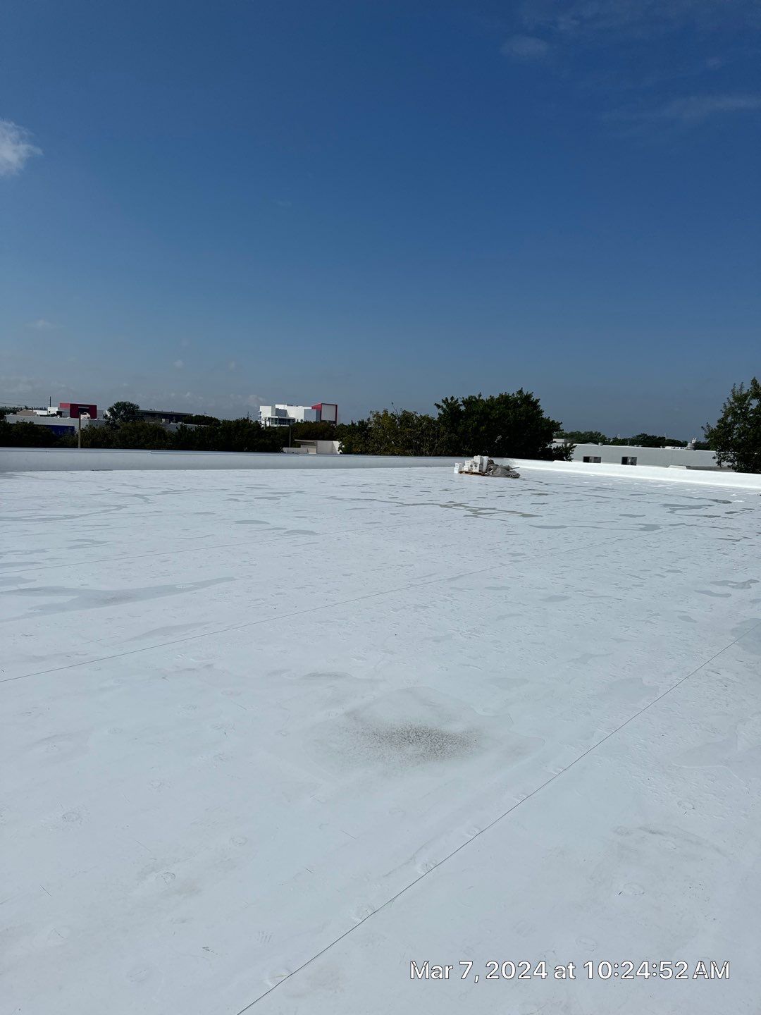 White TPO Membrane Roof Replacement at Doral Commercial Building by AJF ROOFING INC