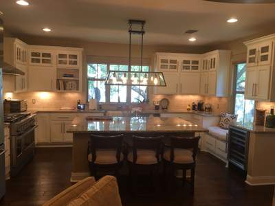 Kitchen Elegance: Transforming Spaces with a Cabinet Symphony of Brightness and Style!