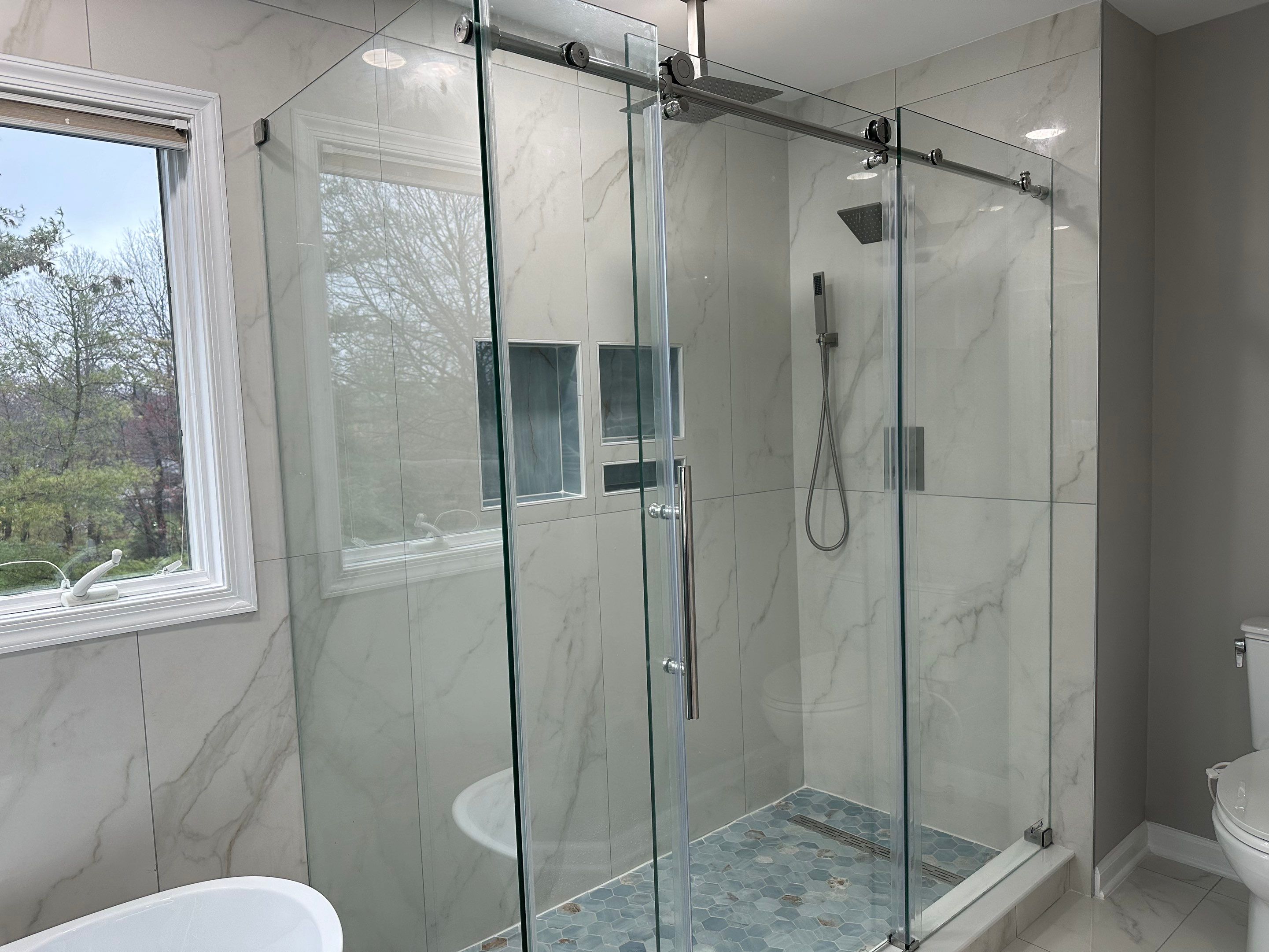 Bathroom Remodel using Tile by Home Concepts Construction