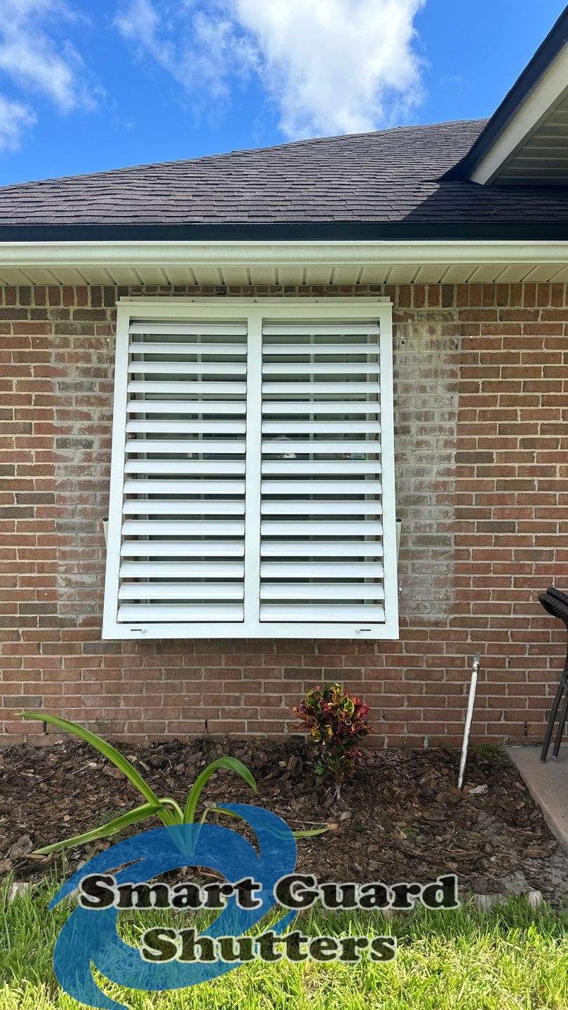 Impact Bahama Shutters in Signal White by Smart Guard Shutters