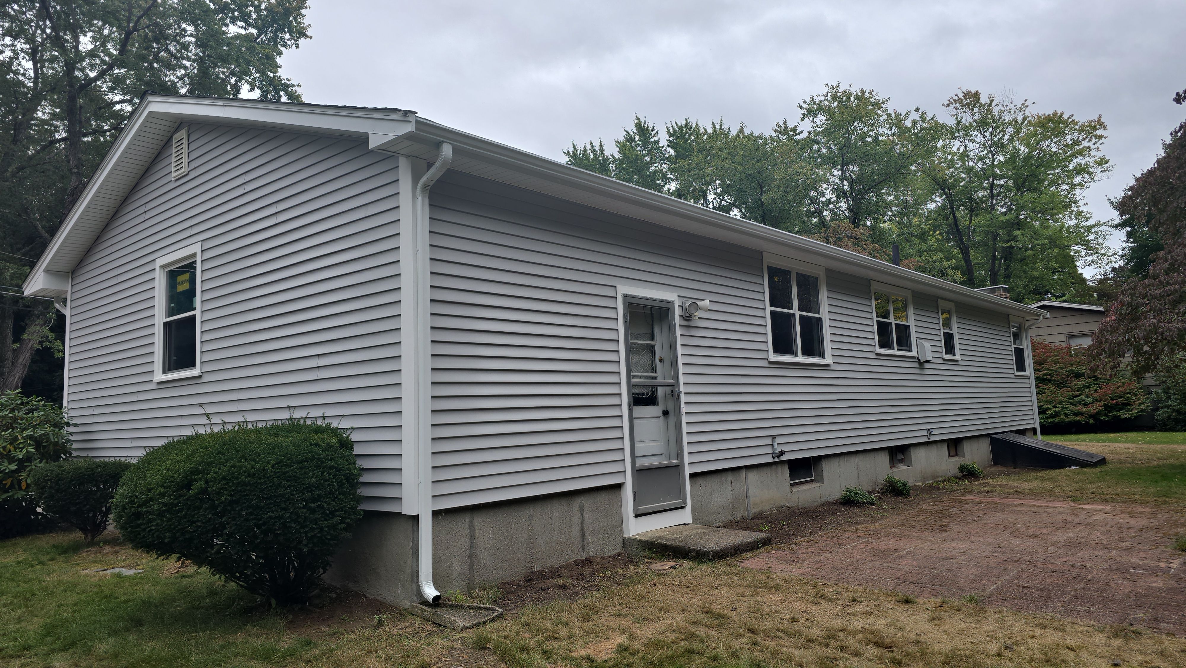 Complete exterior remodeling in NAtick, MA by UBrothers Construction