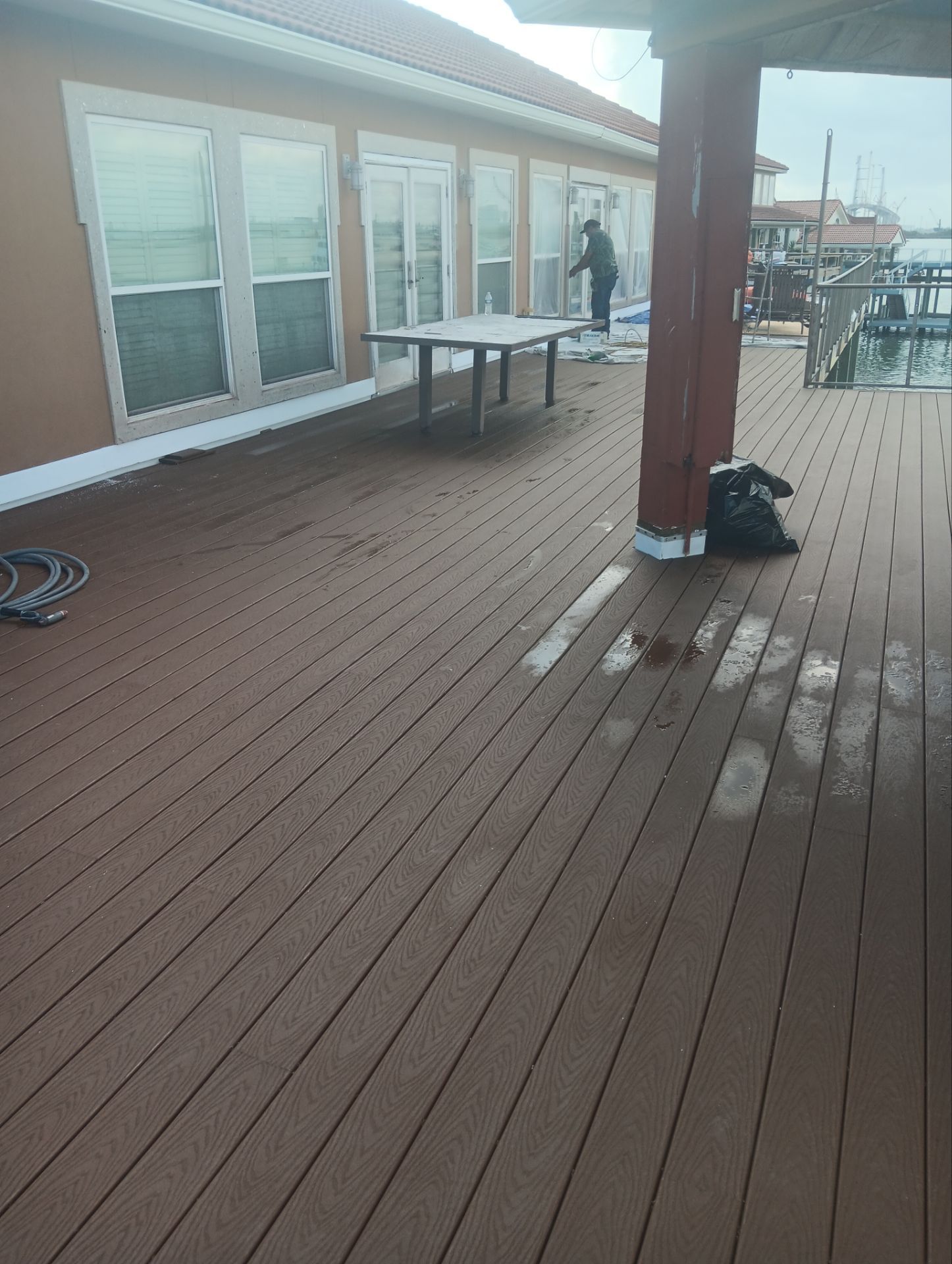 Waterfront Walkout Waterproofed! by Bayfront Roofing and Construction