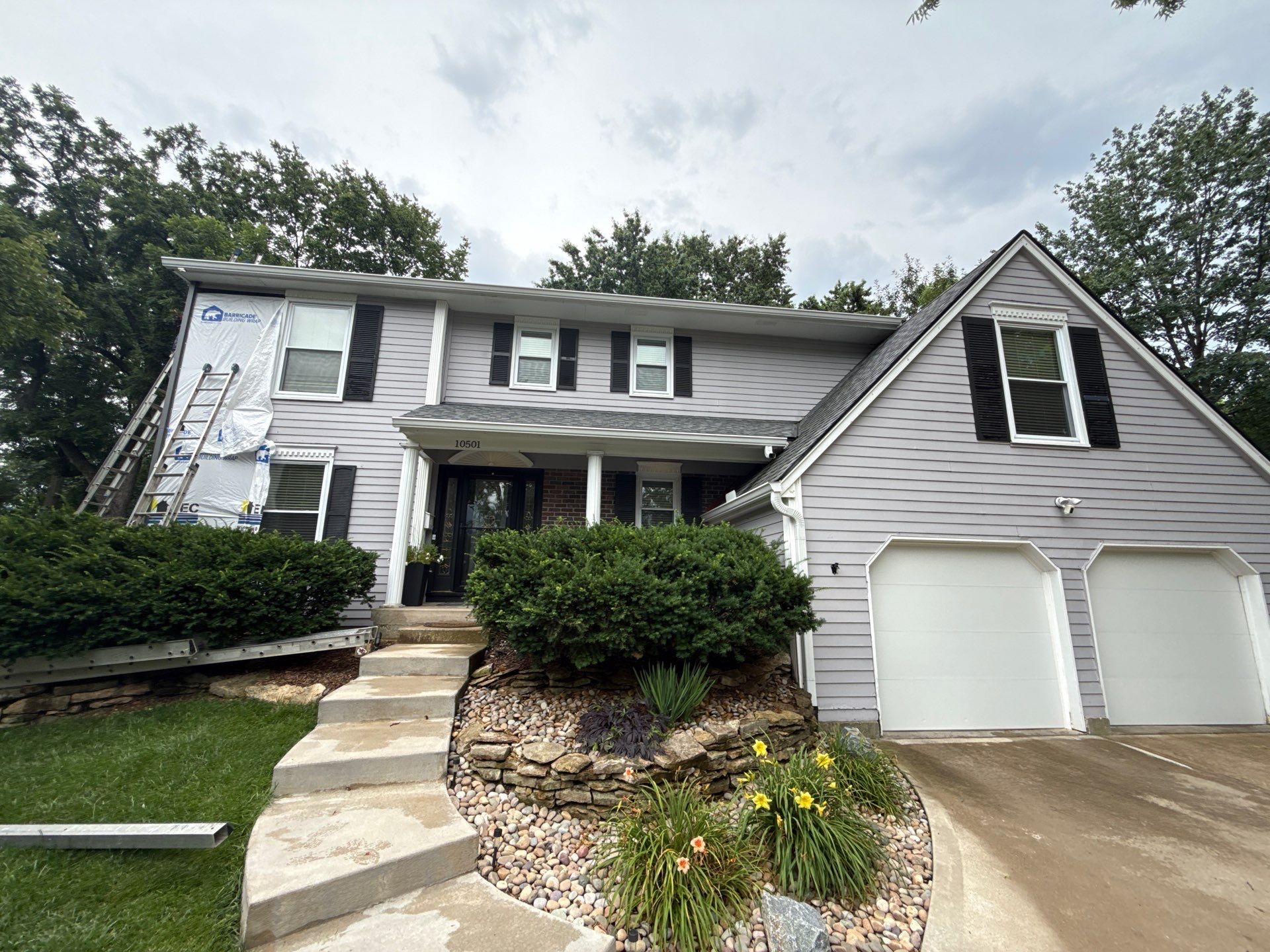 Full Exterior Siding Upgrade and Board and Batten Installation in Shawnee by EEC Windows, Siding & Roofing