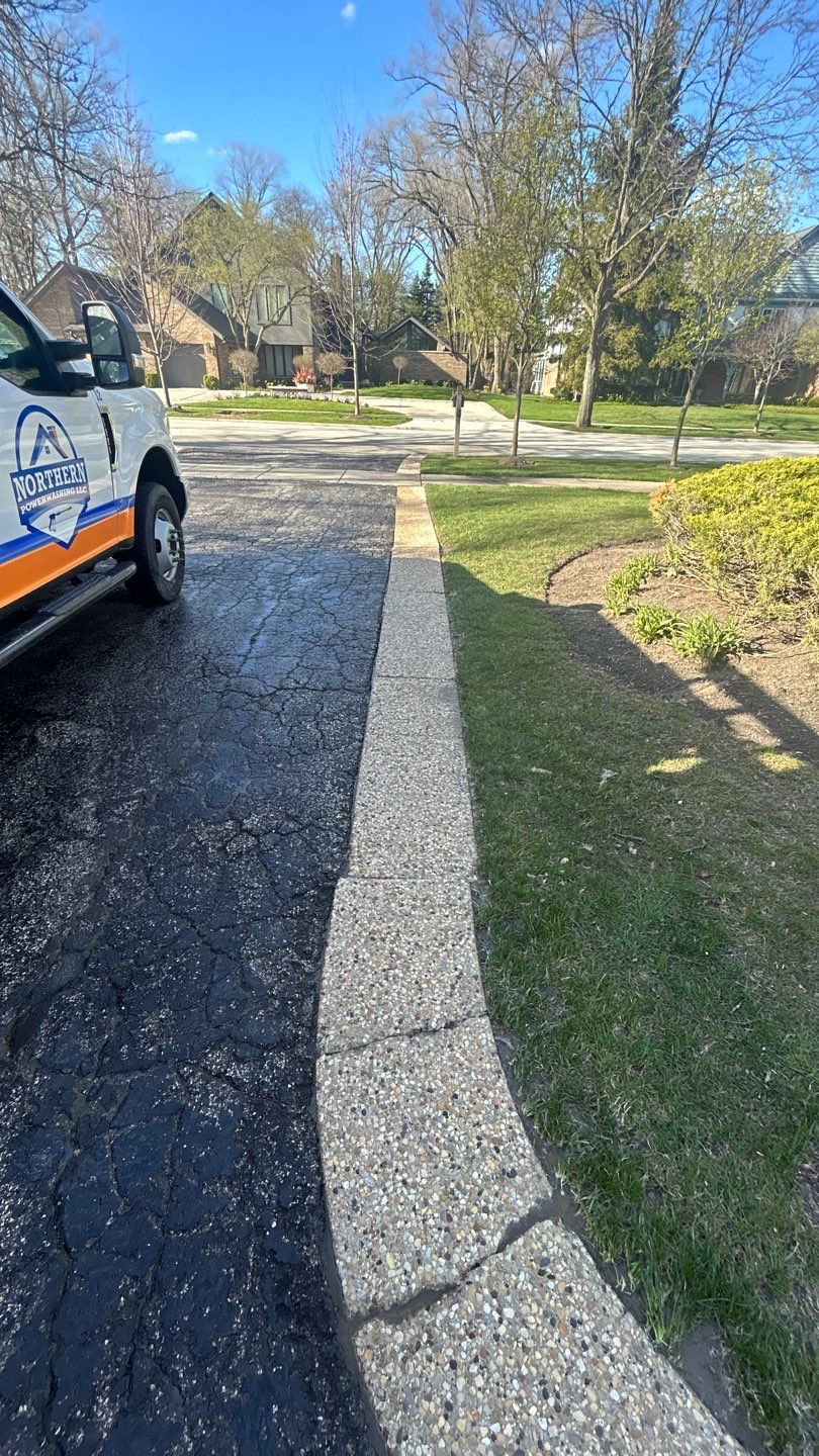 Aggregate Clean and seal using low gloss sealer by Northern Power Washing LLC.