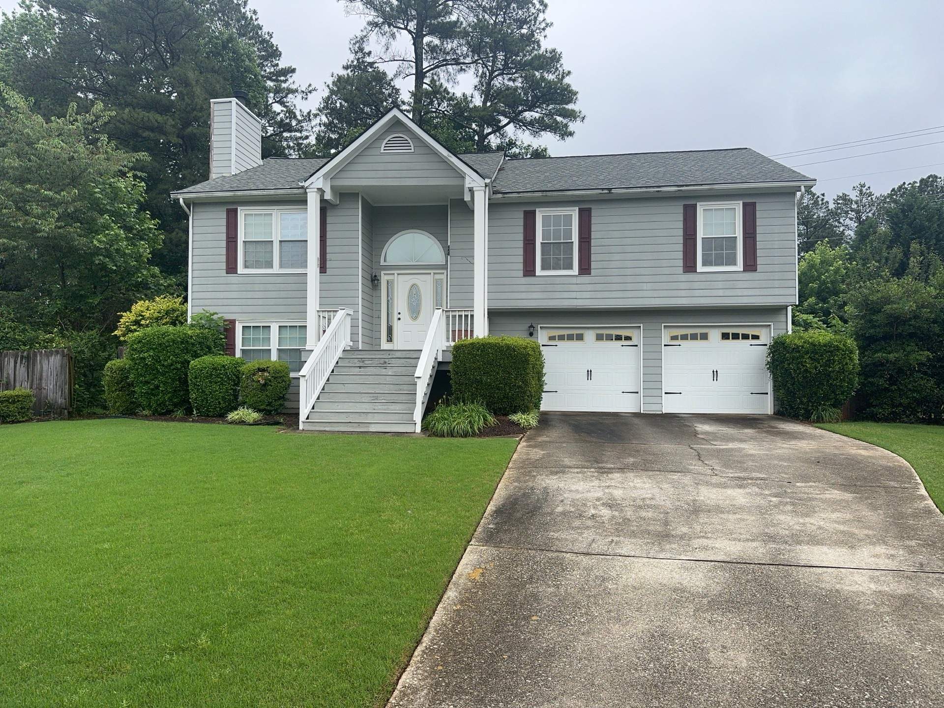 Alpharetta, GA Partial Siding Replacement, Porch Stain, and Exterior Painting by Nelson Exteriors 