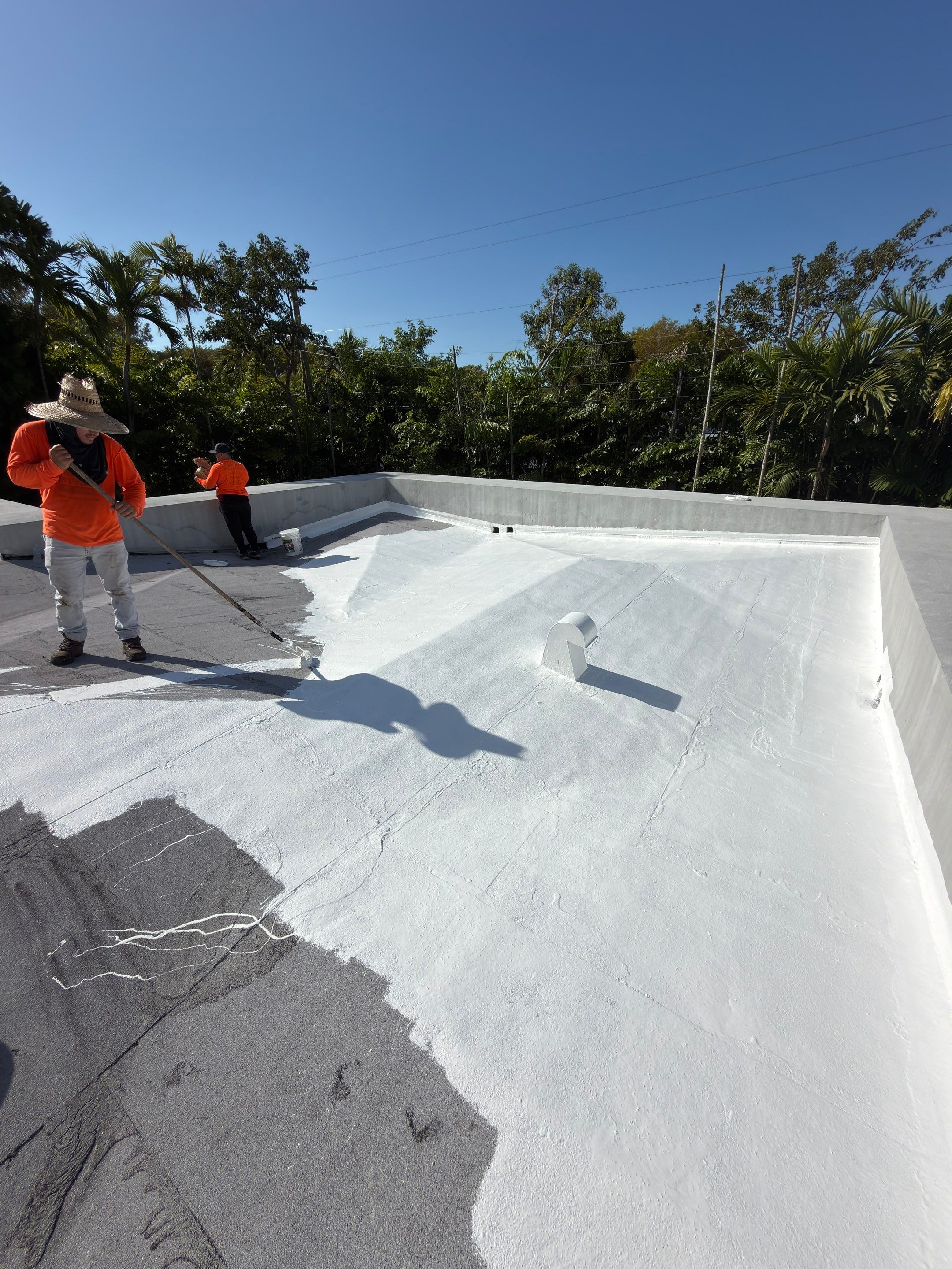 Flat Roof Silicone Coating and Interior Water Damage Restoration in Miami by Picos Construction Engineering