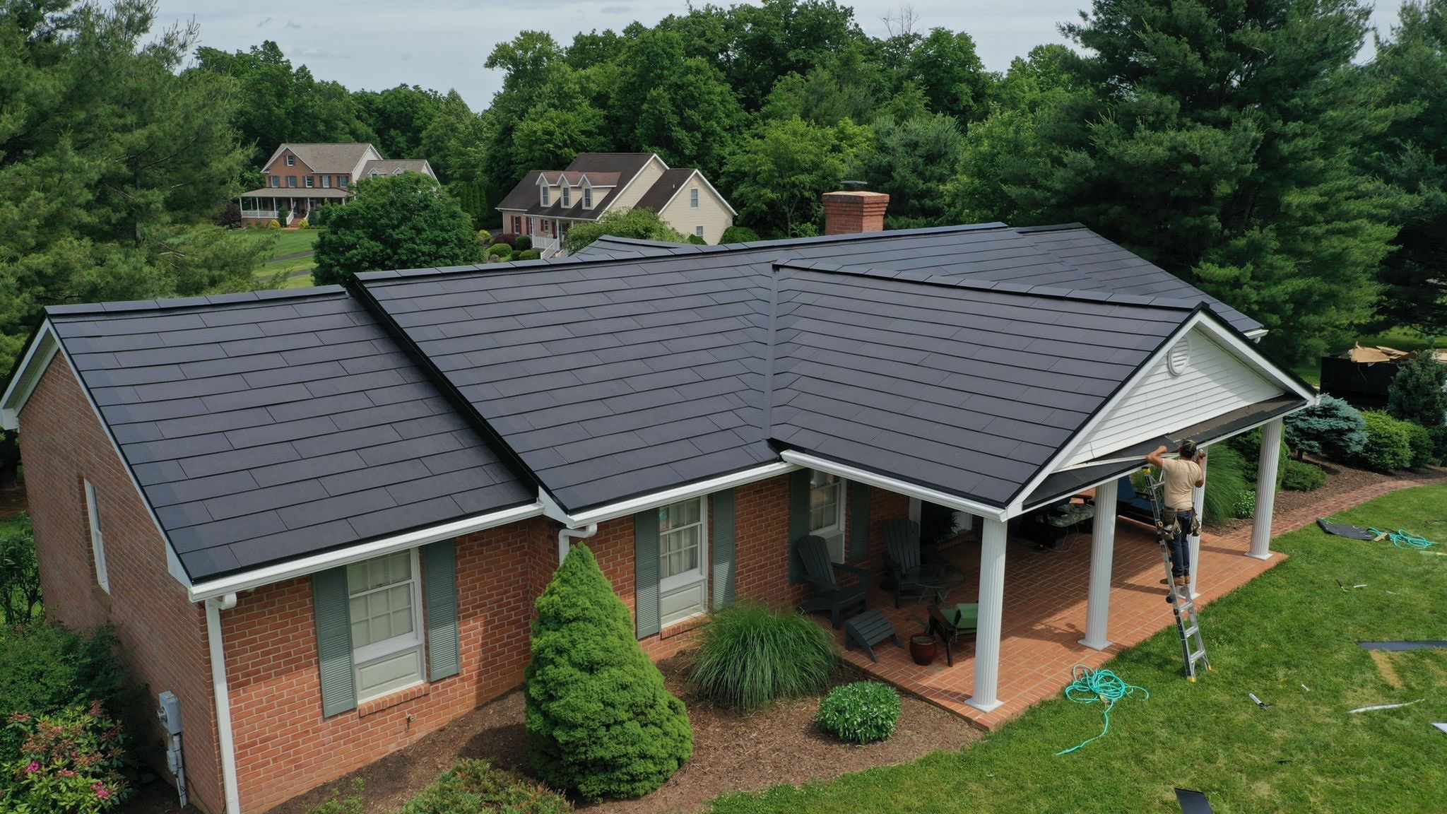 Tesla Solar Roof Installation by American Home Contractors