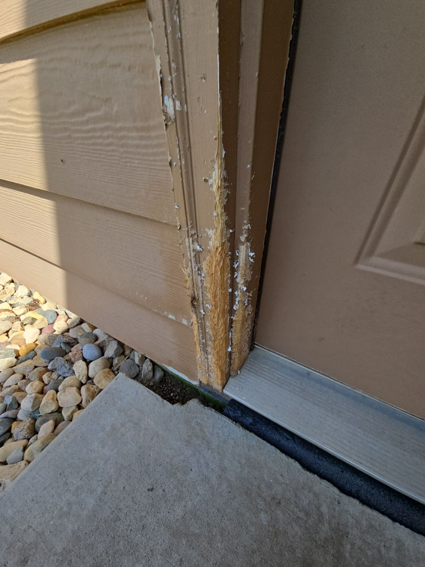 Sioux Falls Residential Exterior Door and Siding Refresh by Select Painting, Coatings & Garage Cabinets