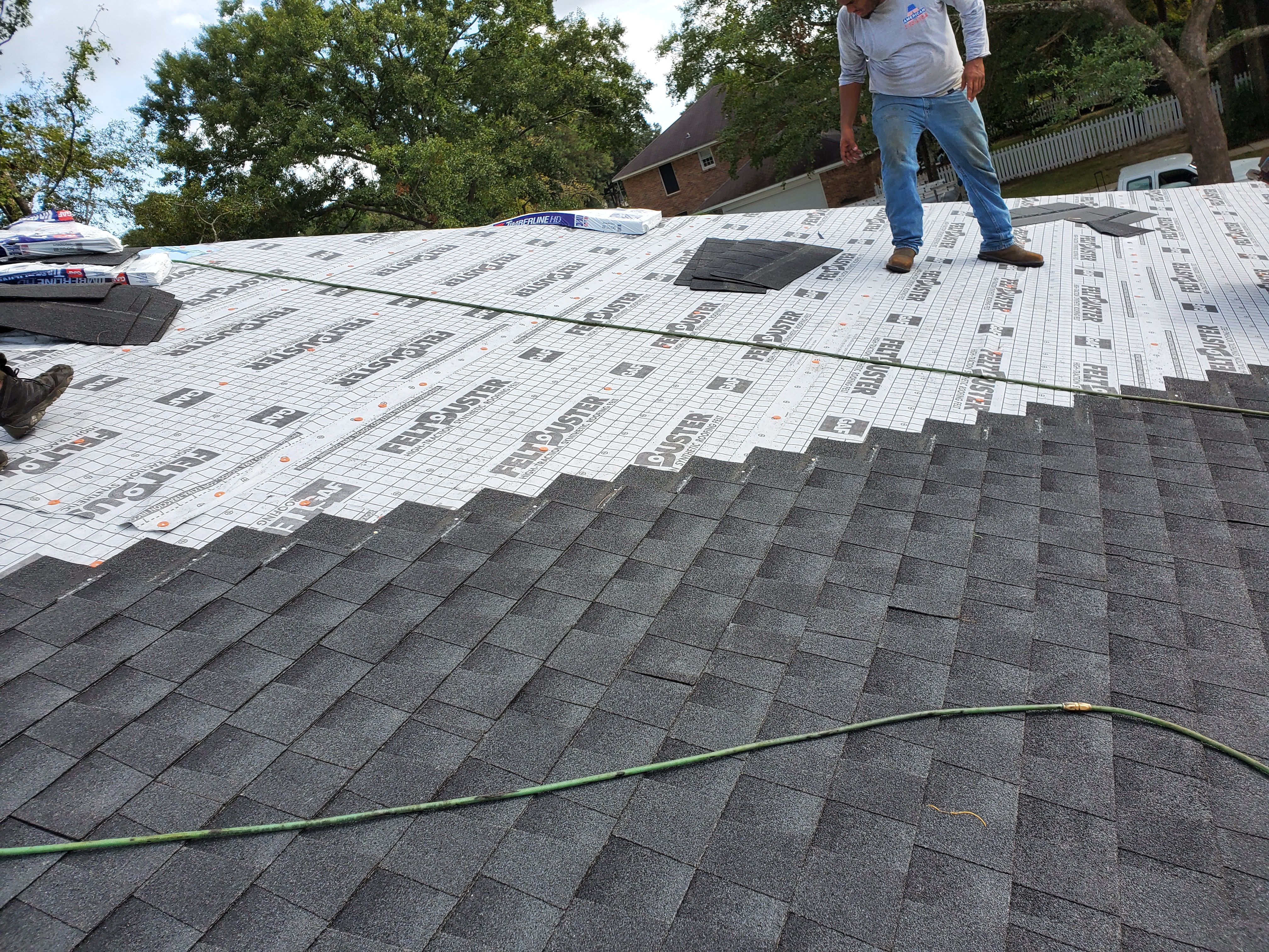 Residential Roofing Installation using Roof Replacement by American Roofing & Construction LLC