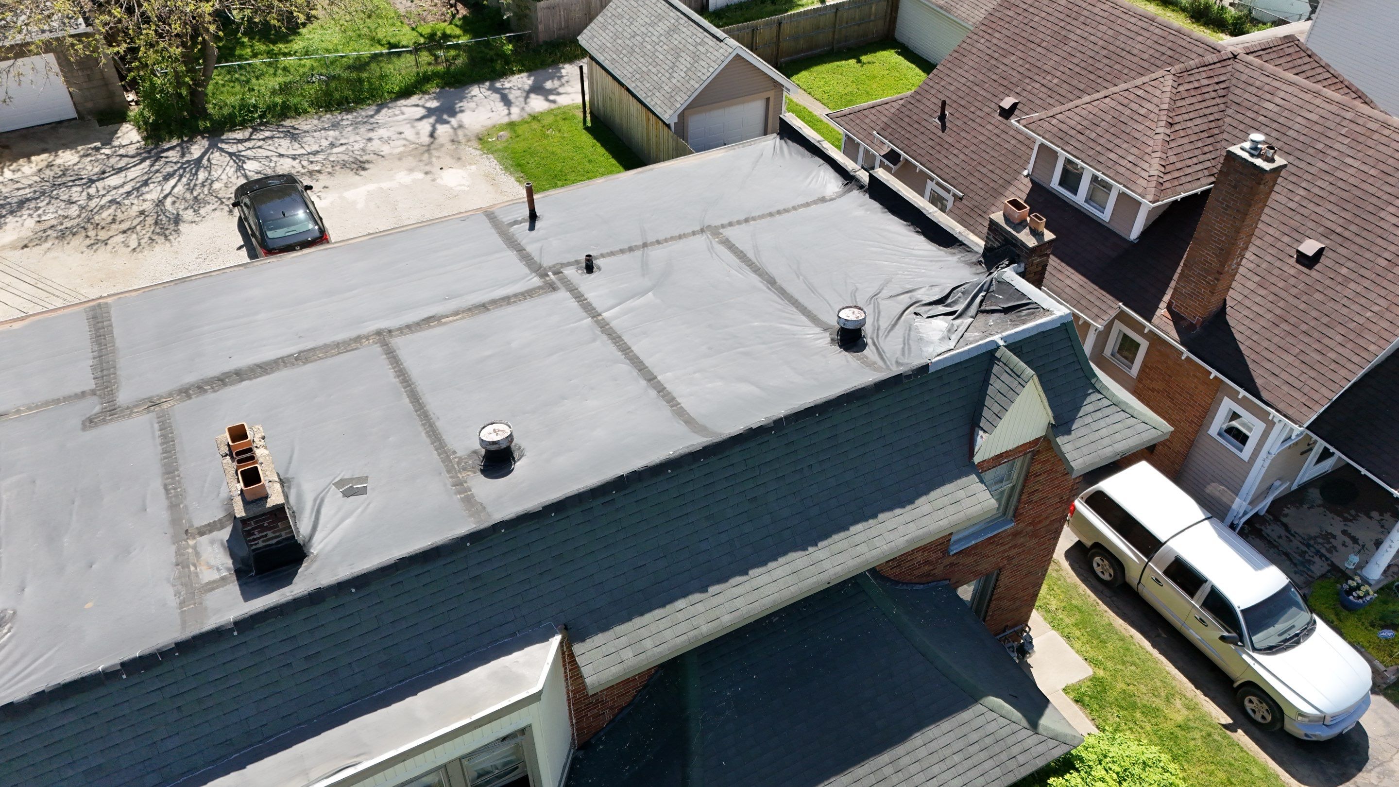 Commercial Flat Roof Replacement by Nitro Roofing and Construction