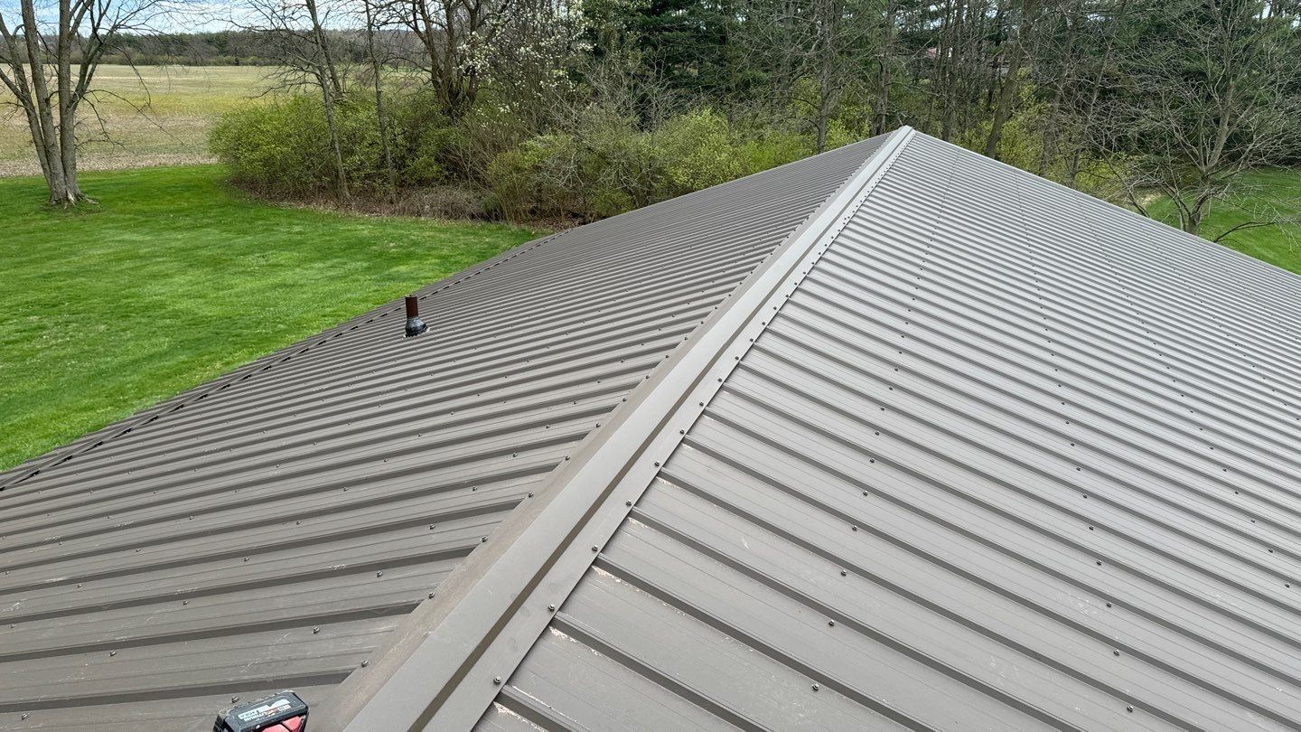 Residential Roofing Installation using Performance Panel Metal - Crinkle Bronze by RoofX 
