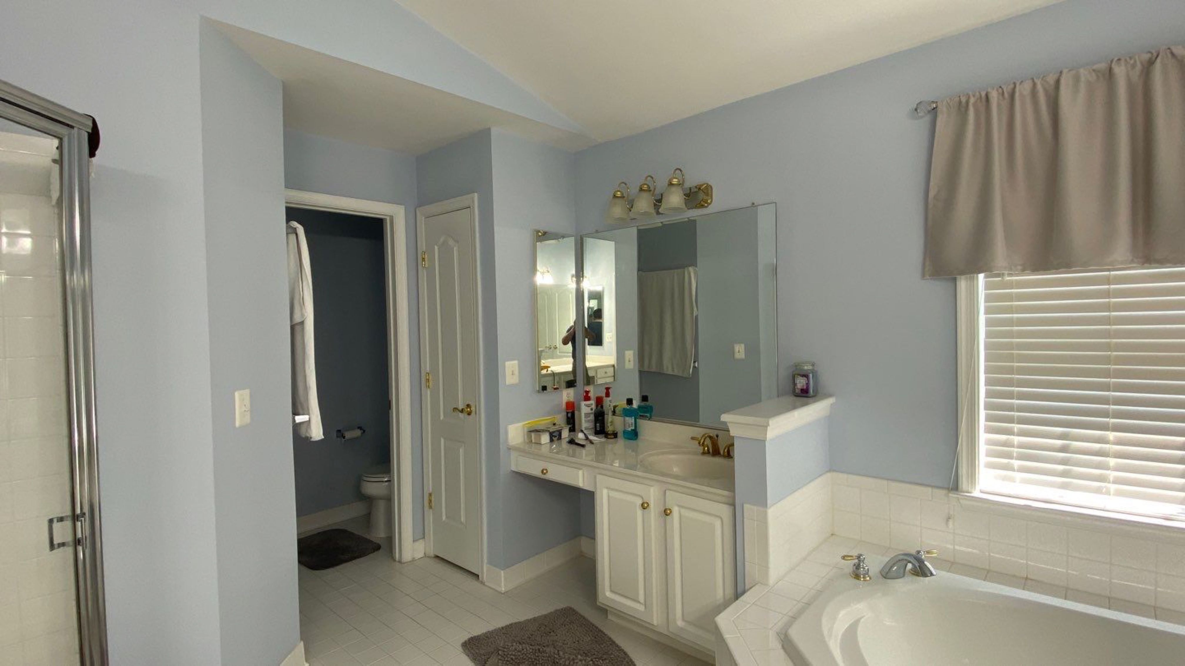 Bathroom Remodel using porcelain tiles , wood make vanetys , mirross , bathroom accessories  by Jesus Master Handyman LLC 