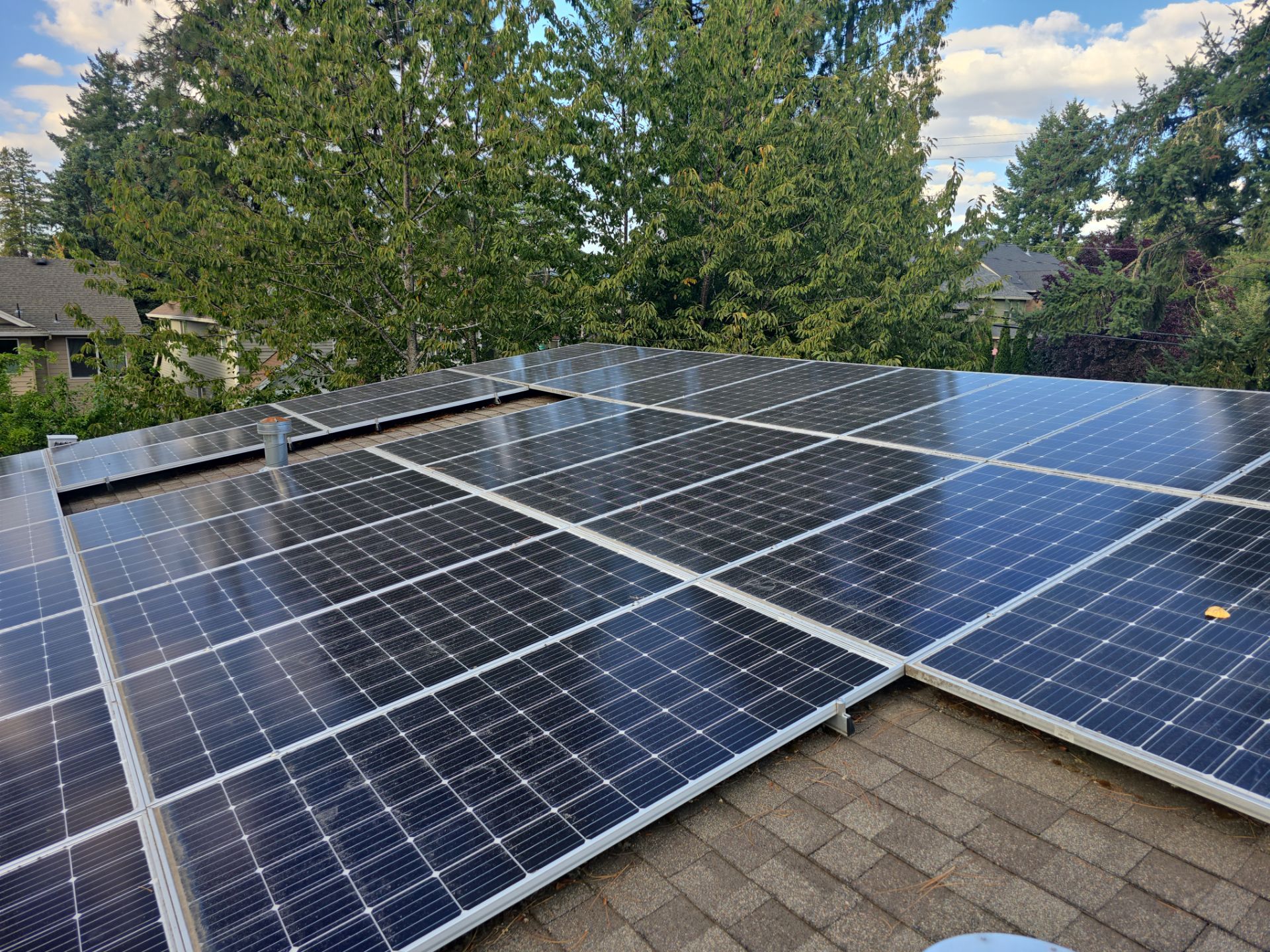 New Metal Roof and replace solar panels by Hawthorne General Construction