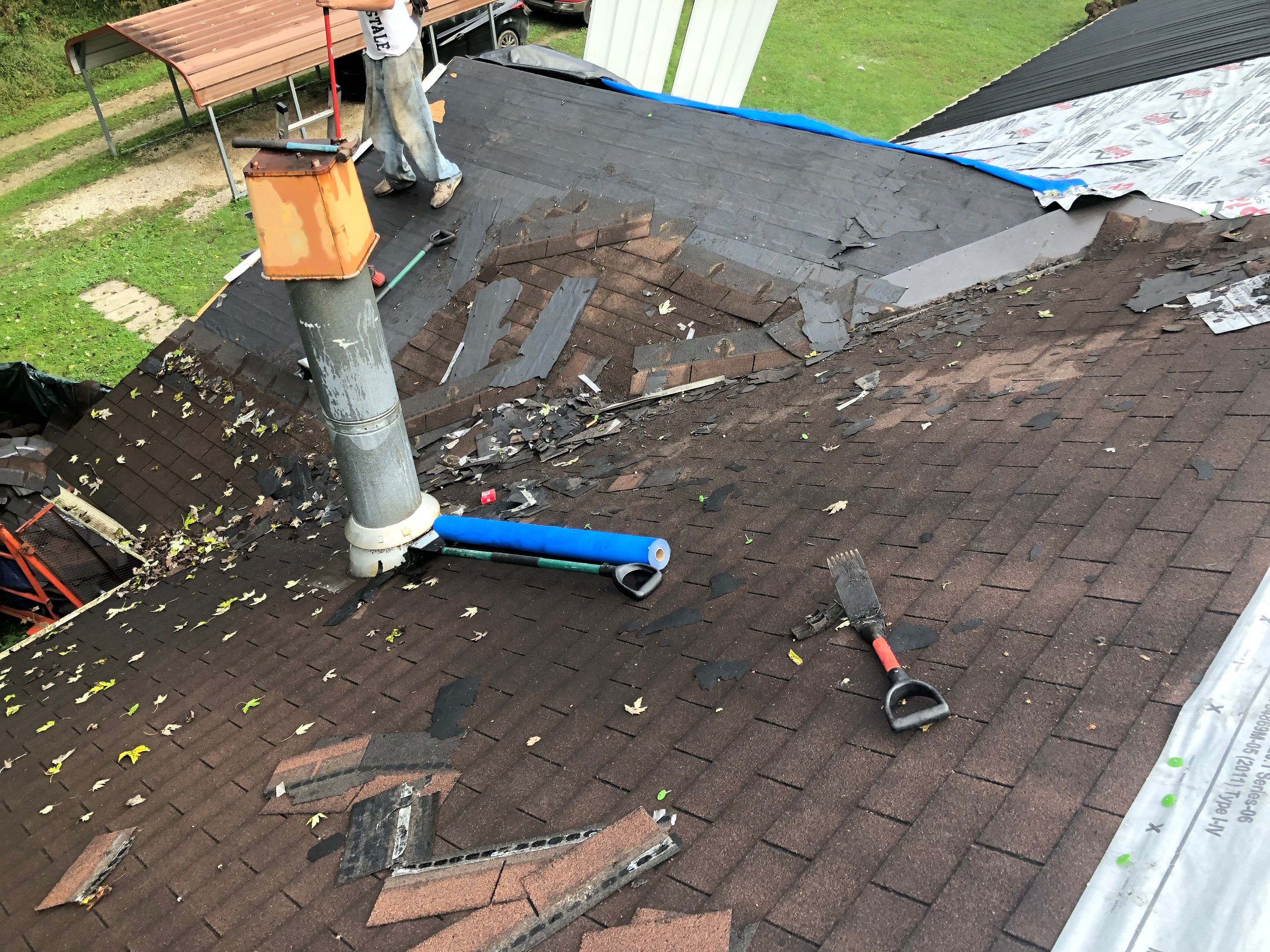 Metal Roof and Vinyl Siding, Soffit, Gutters using LifeTite Premium metal roofing  by Secure Construction Company Inc