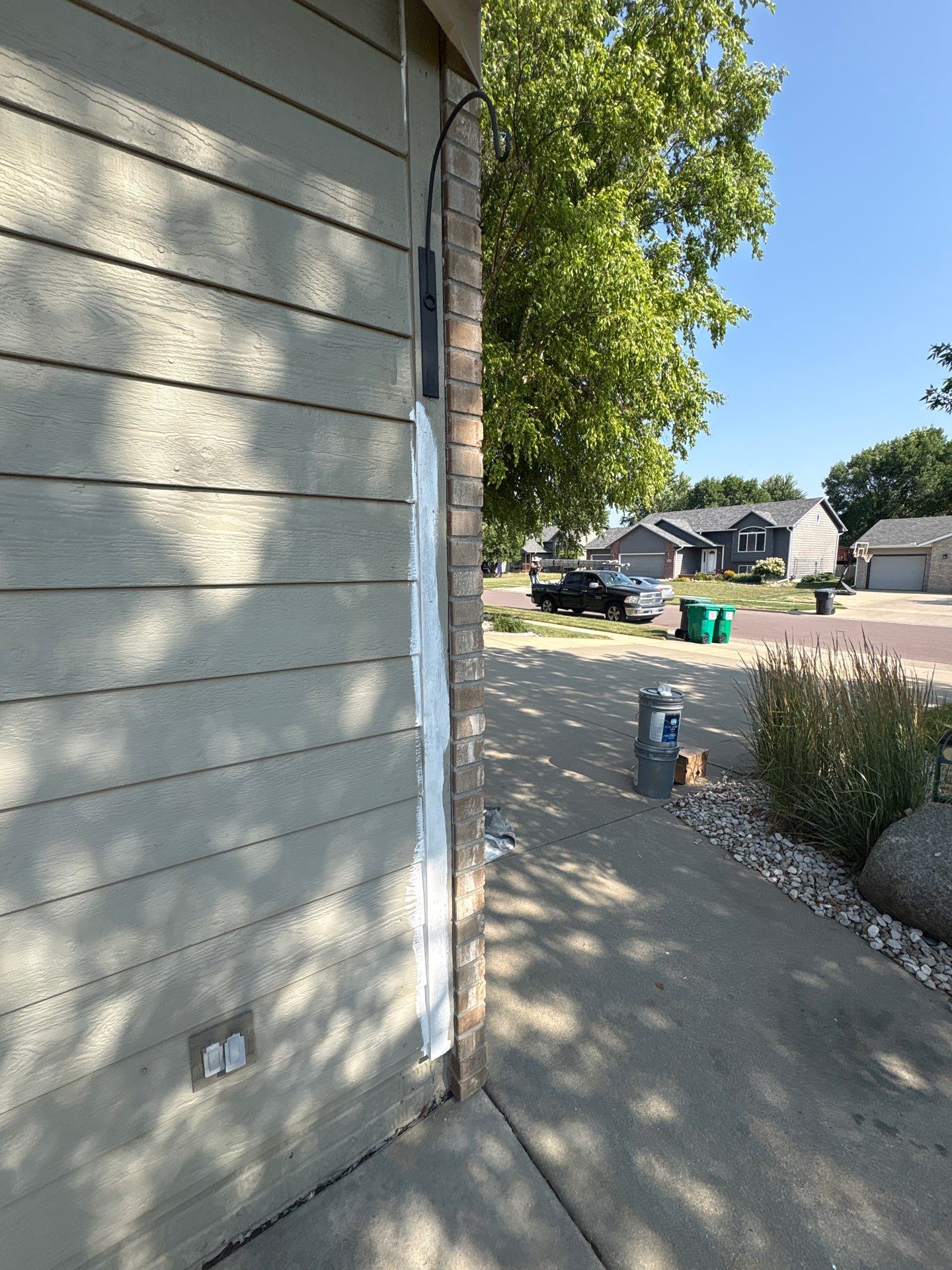 Residential Exterior Painting and Siding Refresh in Sioux Falls by Select Painting, Coatings & Garage Cabinets