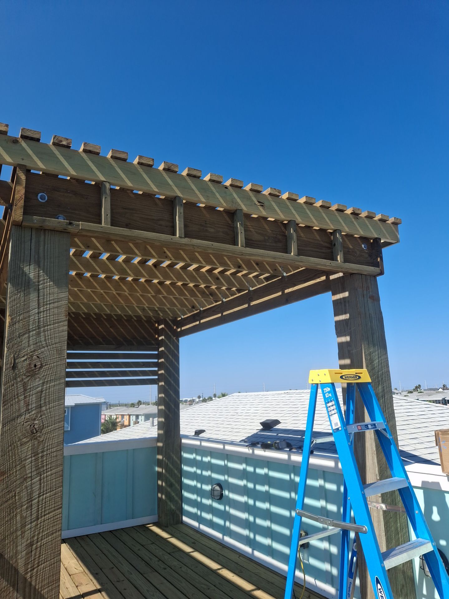 Roof Top Clubhouse on the Beach by Bayfront Roofing and Construction