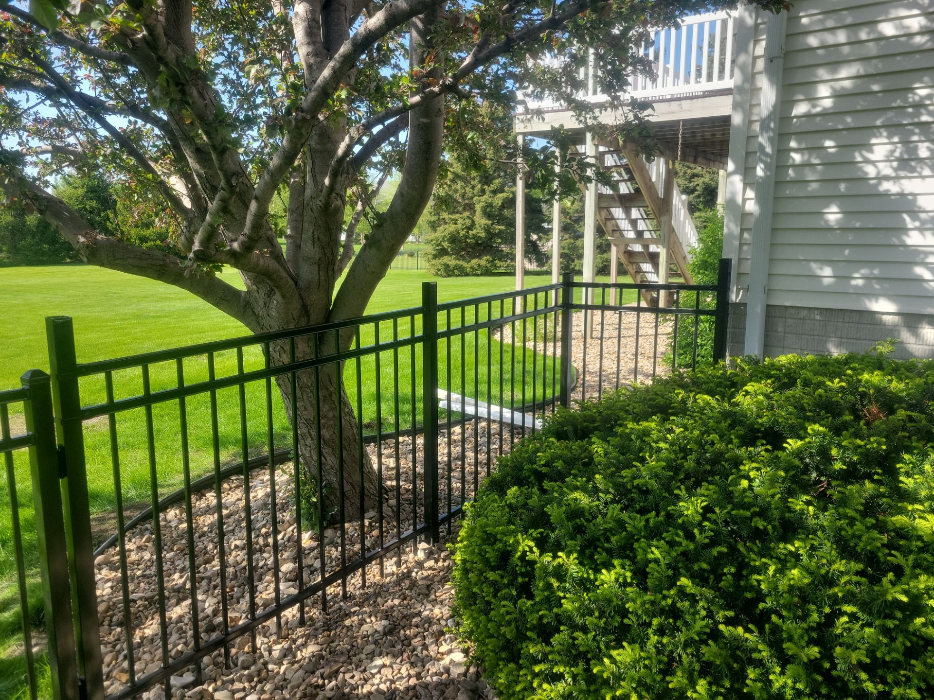 Black Ornamental Metal Picket Fence Installation in Waterloo by Perfect Picket Fence and Stain