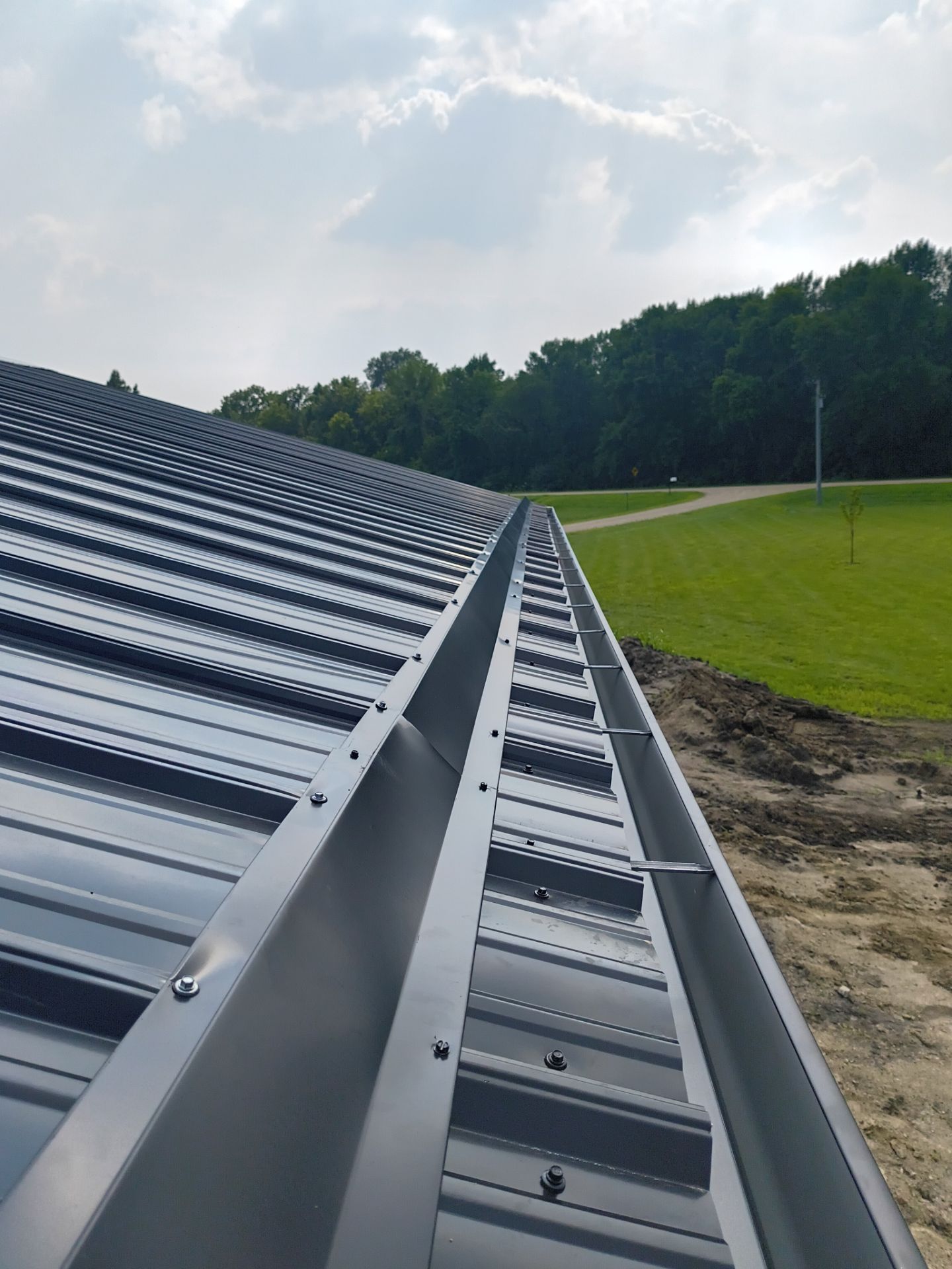 6-Inch K-Style Black Seamless Gutter Installation with Snow Rails – Dassel, MN by Next Level Seamless Gutters / Exteriors Inc.