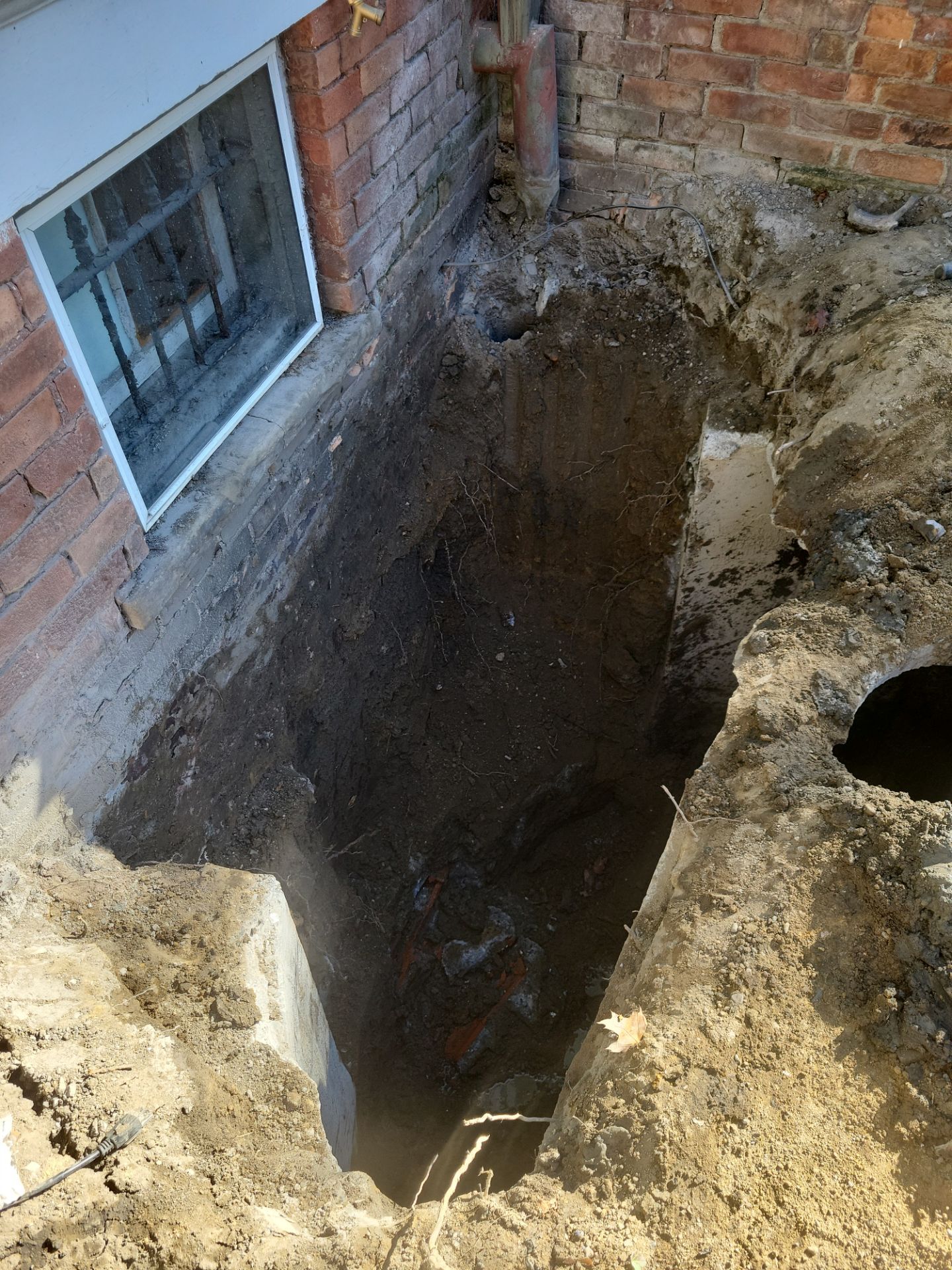 Exterior Basement Waterproofing & Combo Sump Backup System by Toledo Basement Repair