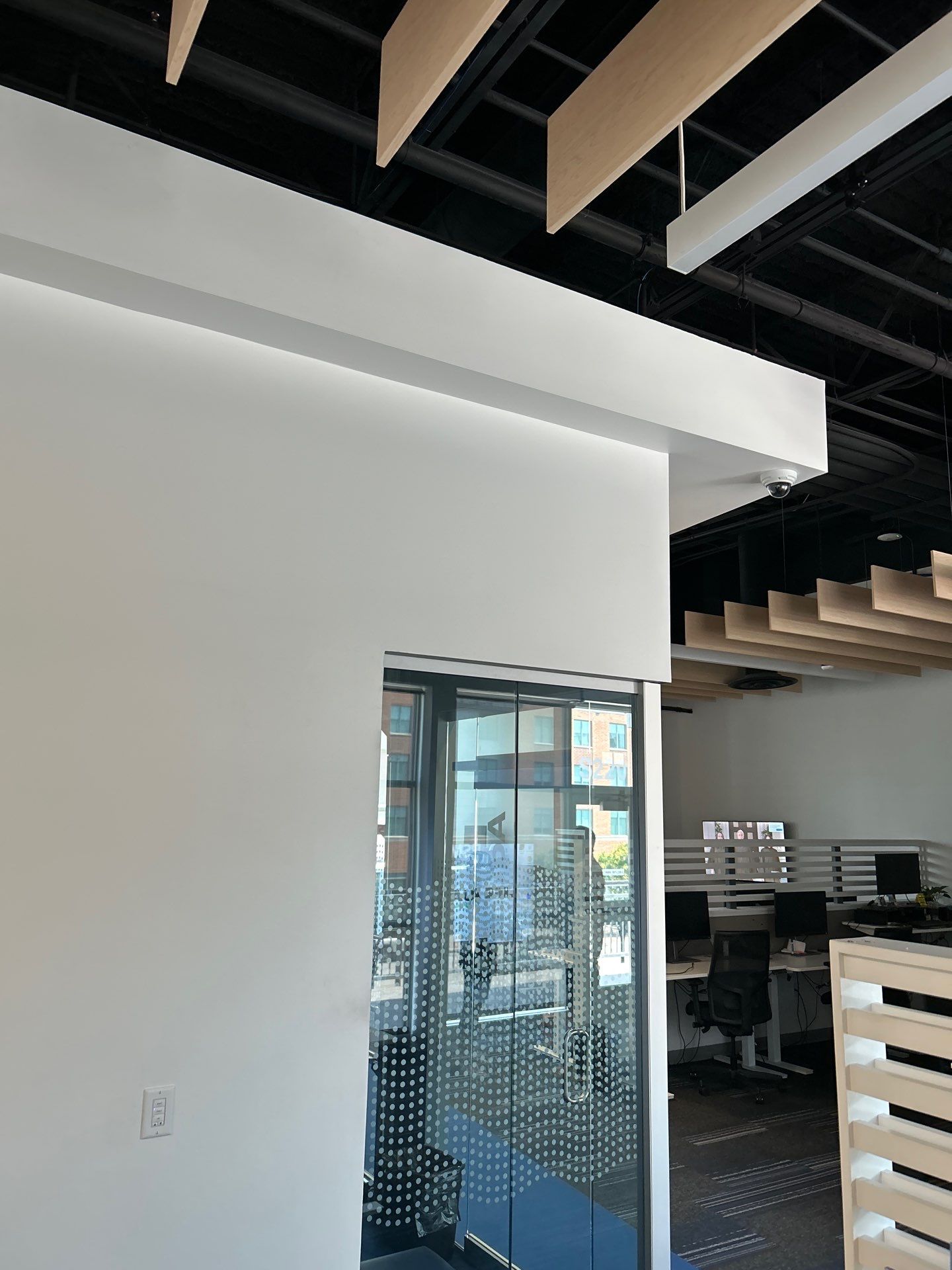 Office Remodel Featuring Acoustic Baffles and Professional Carpet Installation by CompanyCam Sales Demo
