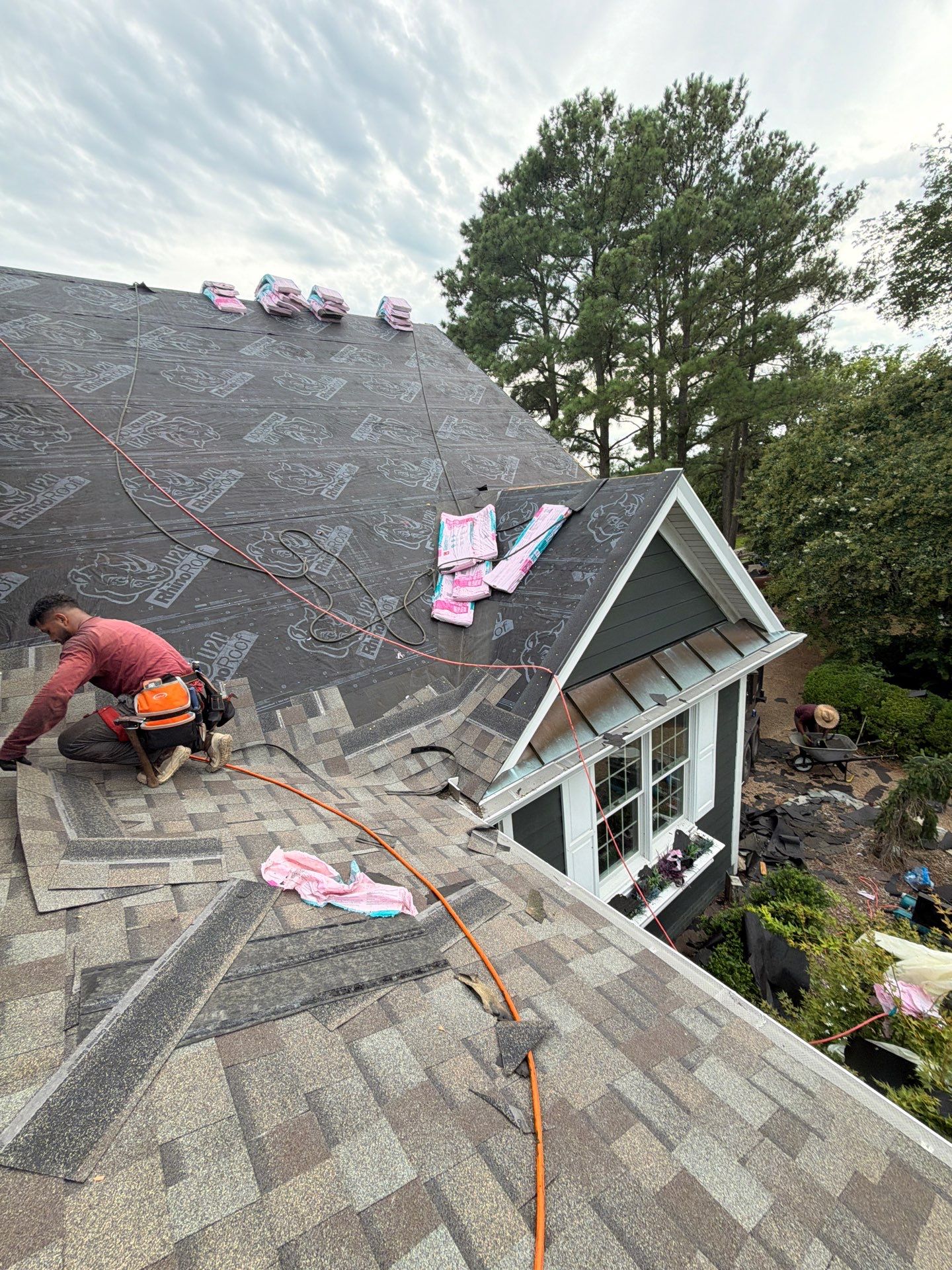 Roof Replacement and White Gutter Installation in Gloucester by Cade Construction