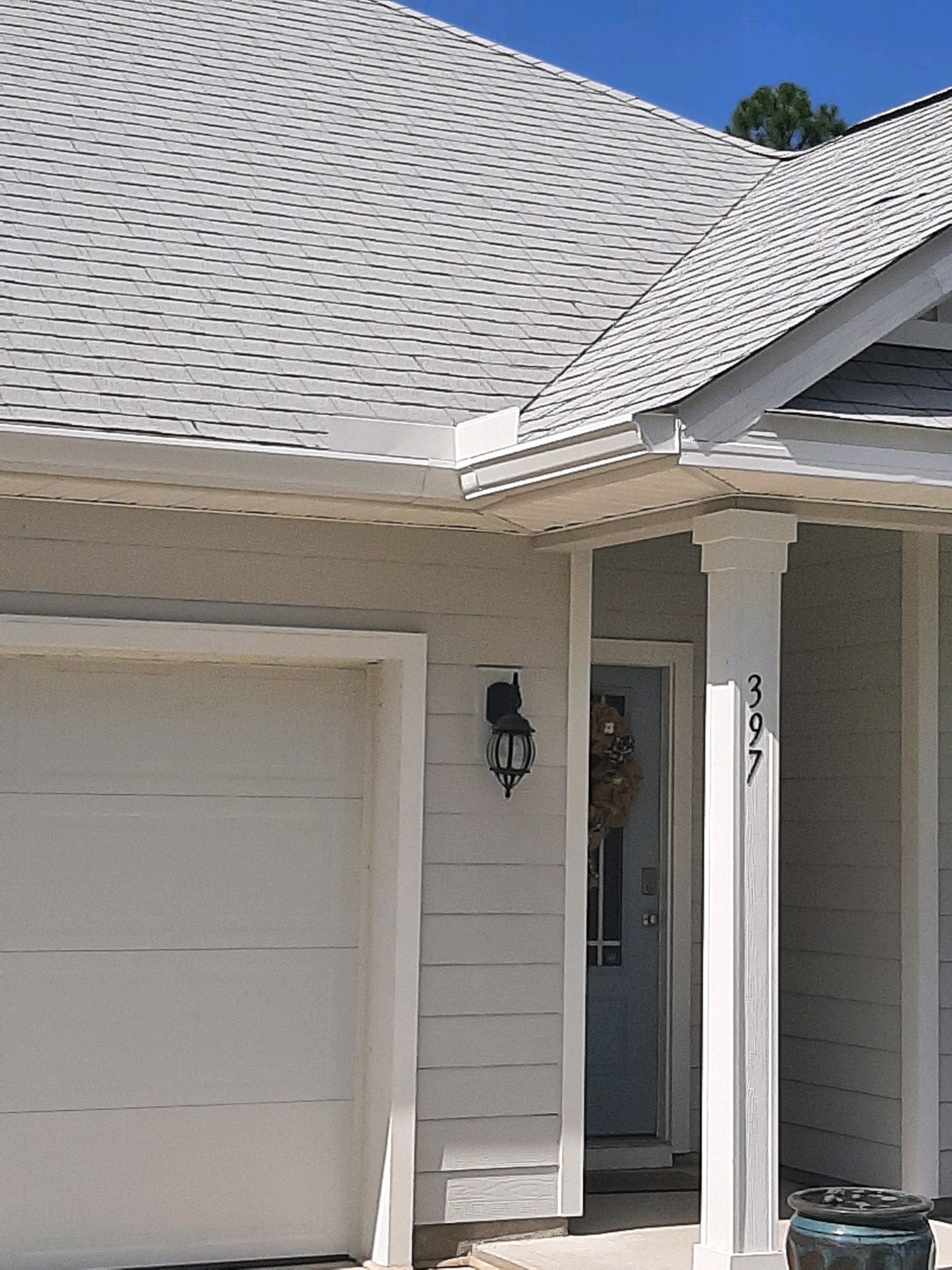 Seamless Gutter Installation using White by Gutter Professors