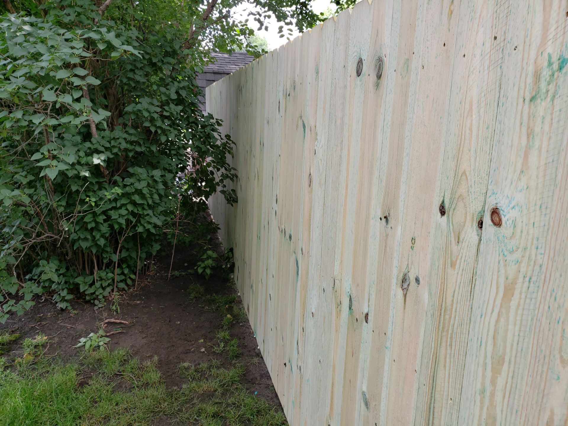 Custom Wood Privacy Fence Installation for Charles City Backyard by Perfect Picket Fence and Stain