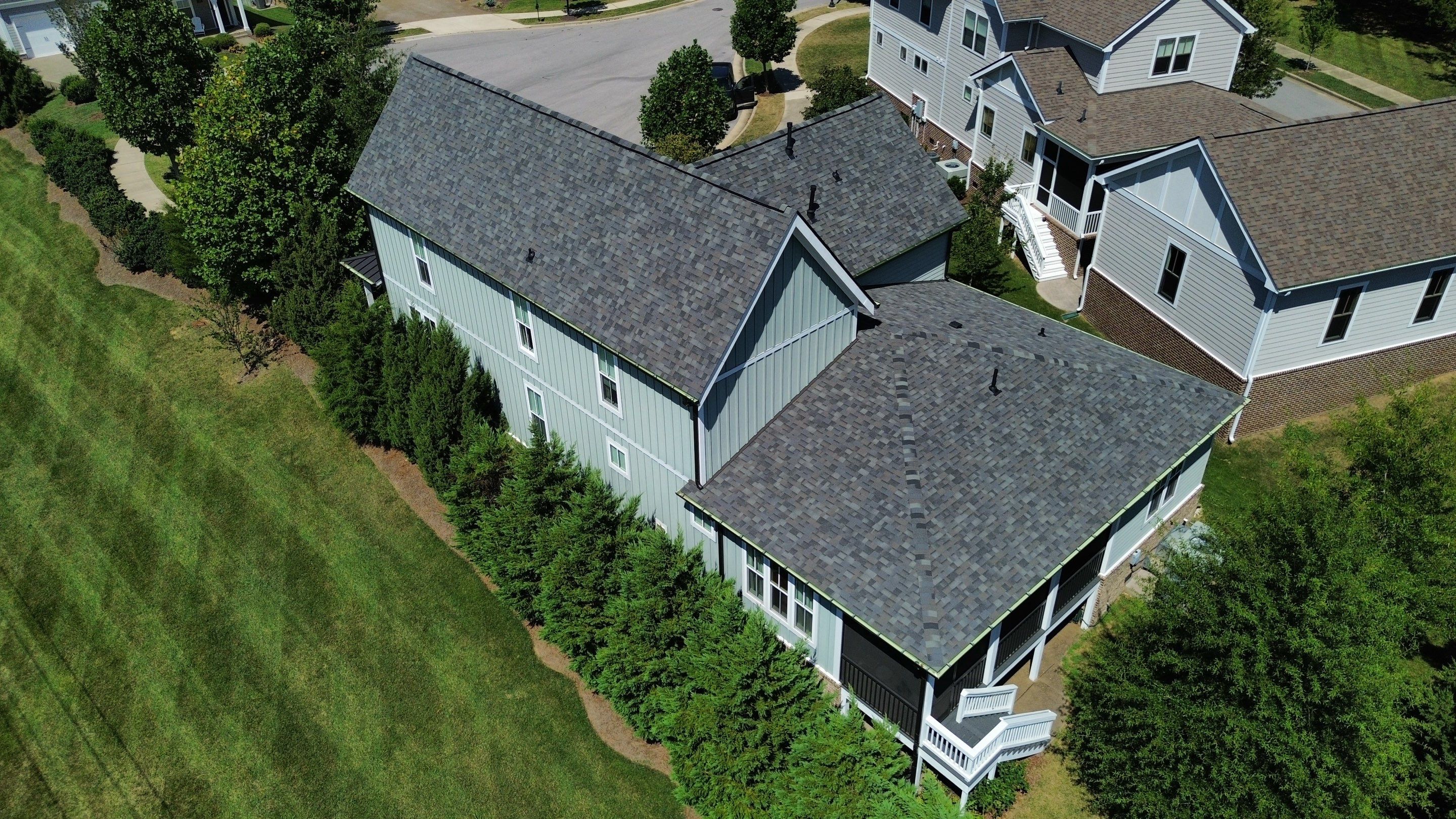Residential Roof Replacement and Bronze Gutter Installation in Franklin by Shinglesmiths Roofing