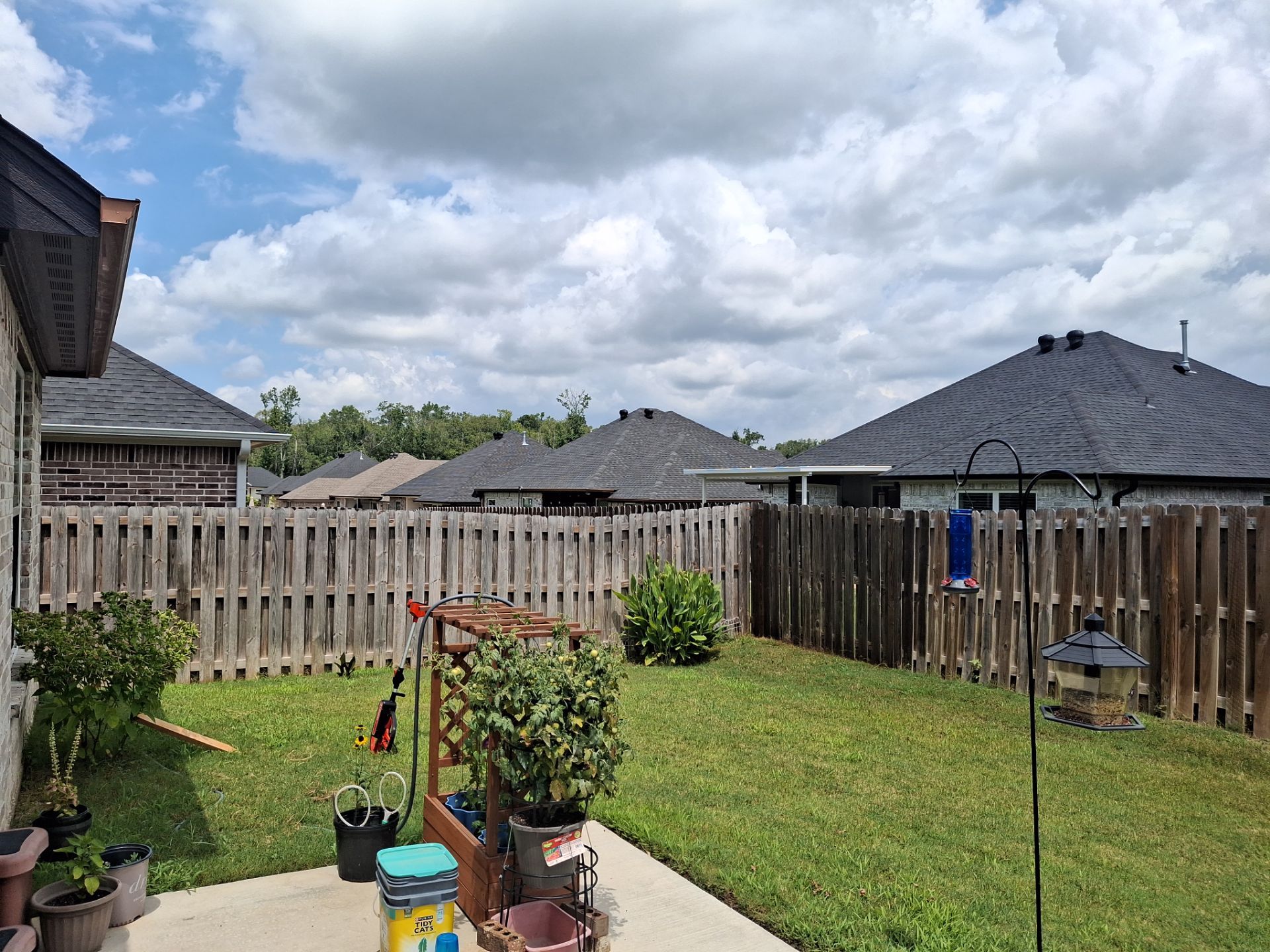Touching Up a Fence in Whitehouse by Quality Coats Painting