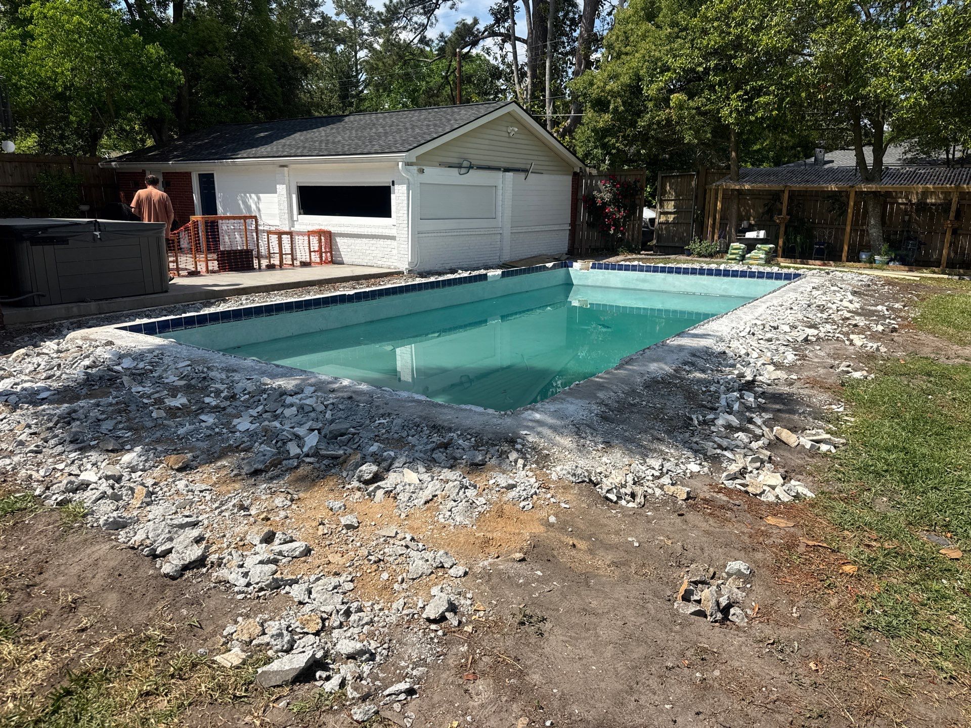 Savannah Pool Deck Replacement with Textured Concrete and Brick Coping by Lowcountry Scapes, LLC