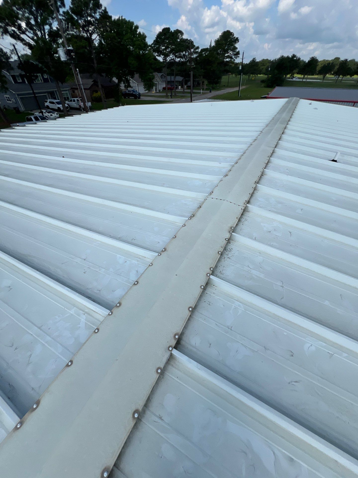 Commercial Roofing Repair using Metal by Roof Repair Company