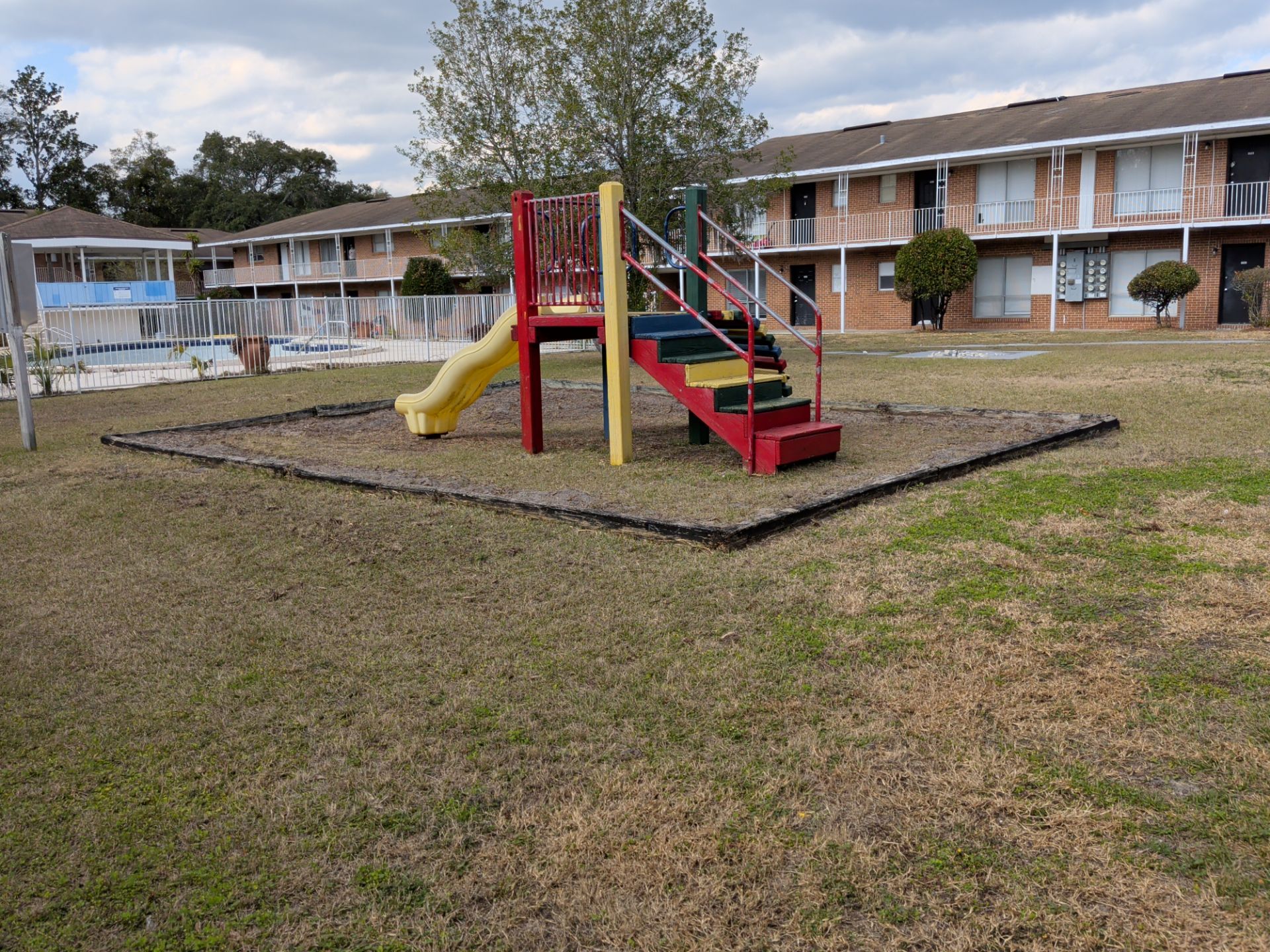 Apartment Landscape Cleanup & Ongoing Grounds Maintenance — Cimarron Apartments (Arlington) by Harmoni Home Services