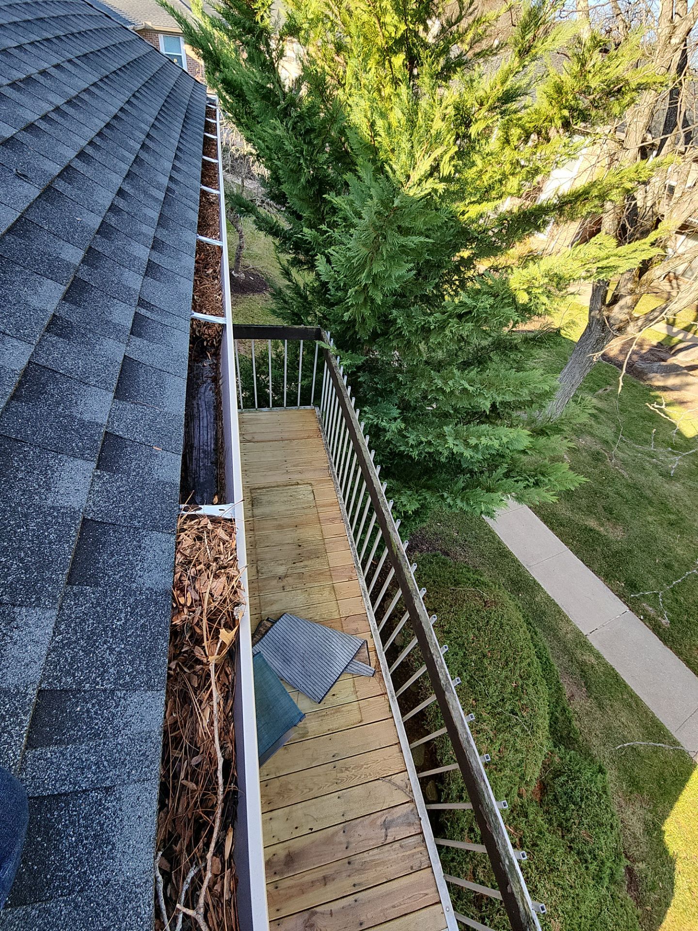 Commercial gutter cleaning Jersey City, NJ before photo with filled gutters