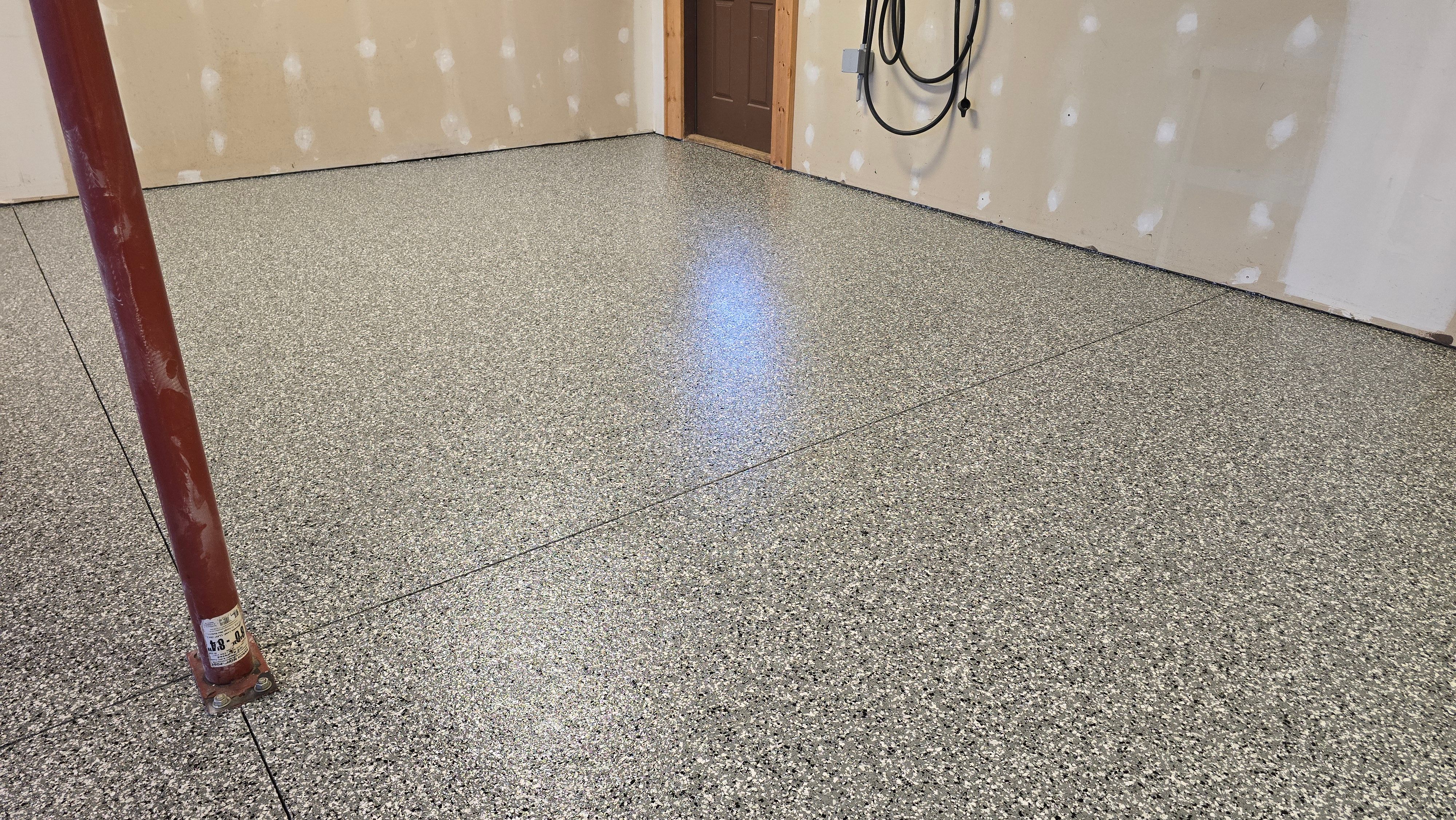 Garages, Basement & Patio Using Wombat & Obsidian by Elite Floor Solutions
