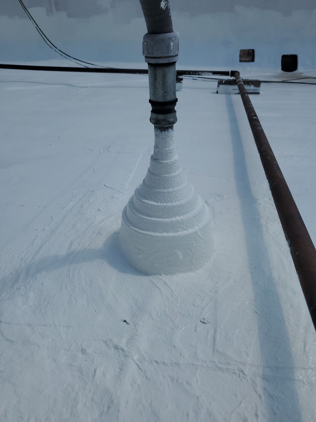 Commercial Roofing Repair using Silicon Roof Coating by JM Flores Roofing & Construction, Inc