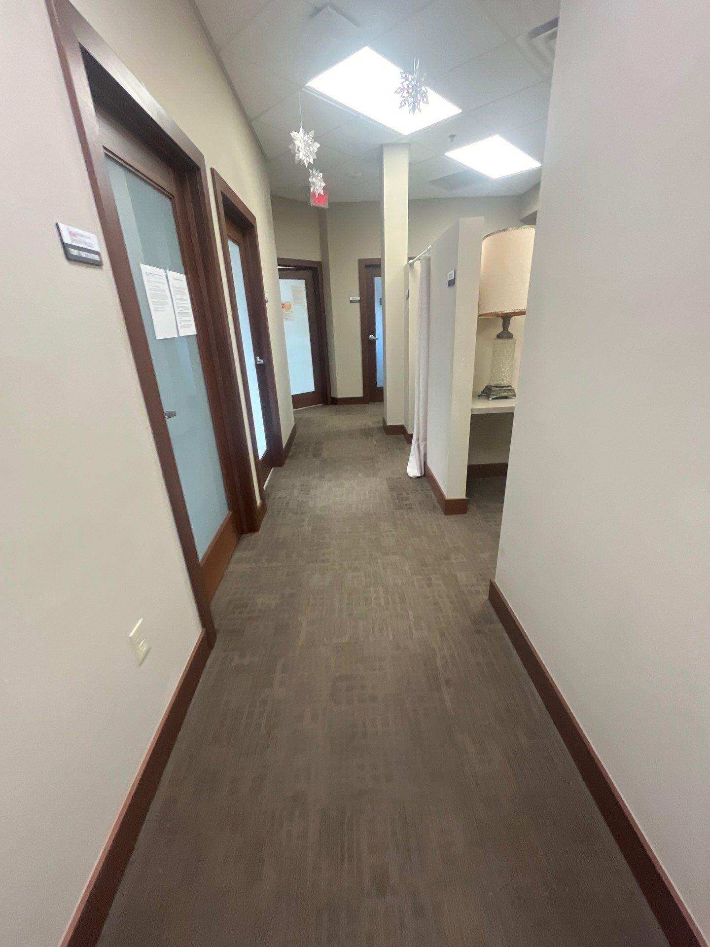 Commercial Office Interior Remodel and Modern Suite Refresh in Sioux Falls by Select Painting, Coatings & Garage Cabinets