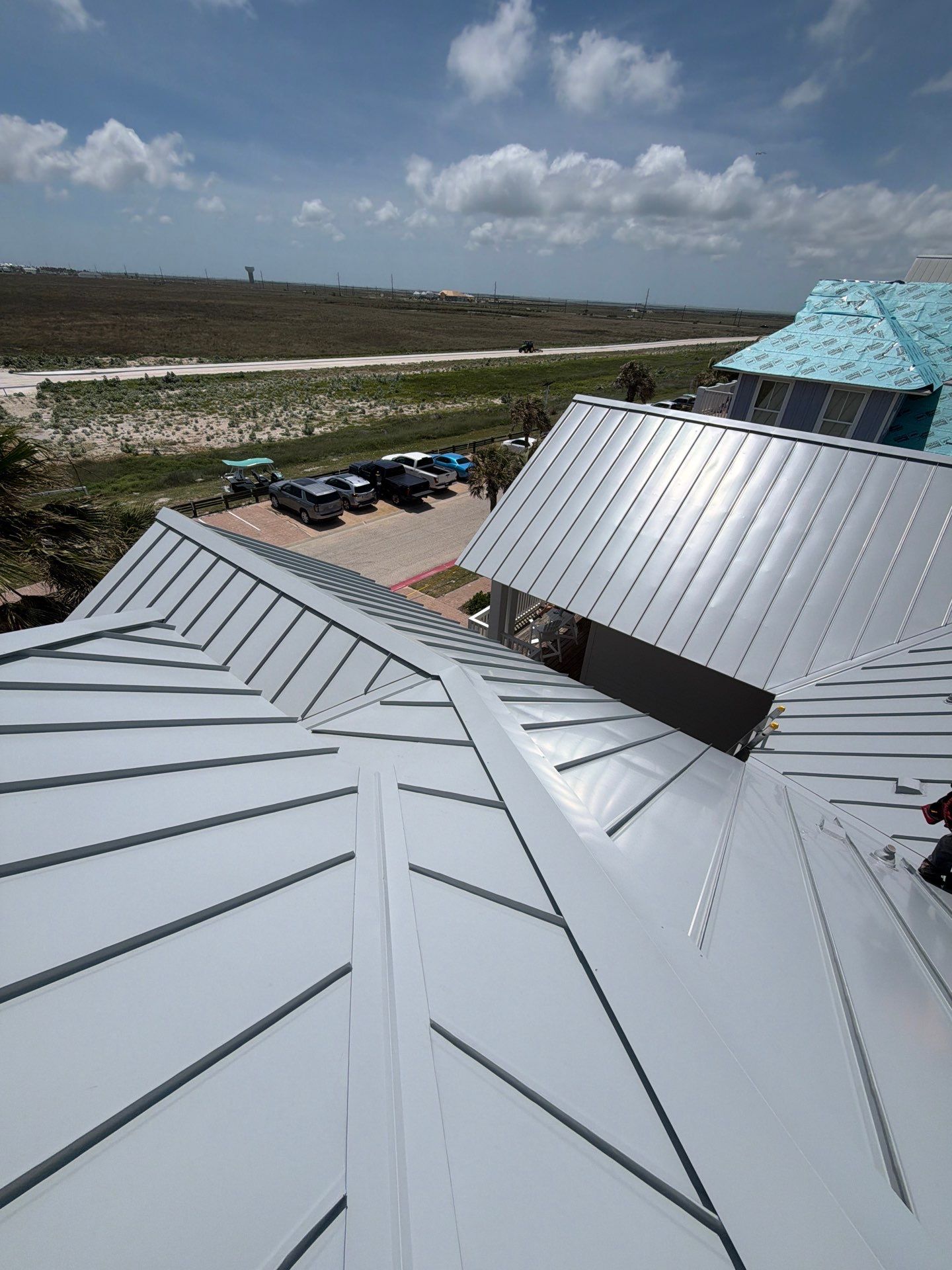 Residential Roof Replacement using 24 GA Double-Lock - Match Dove Grey by Action Exteriors Austin