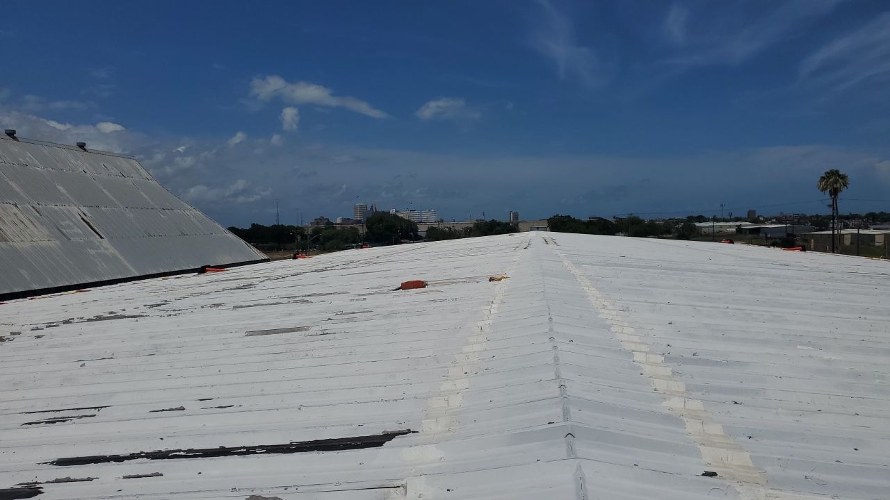 Commercial Roofing Installation using GAF 10 Year Acrylic System by Lighthouse Roofing