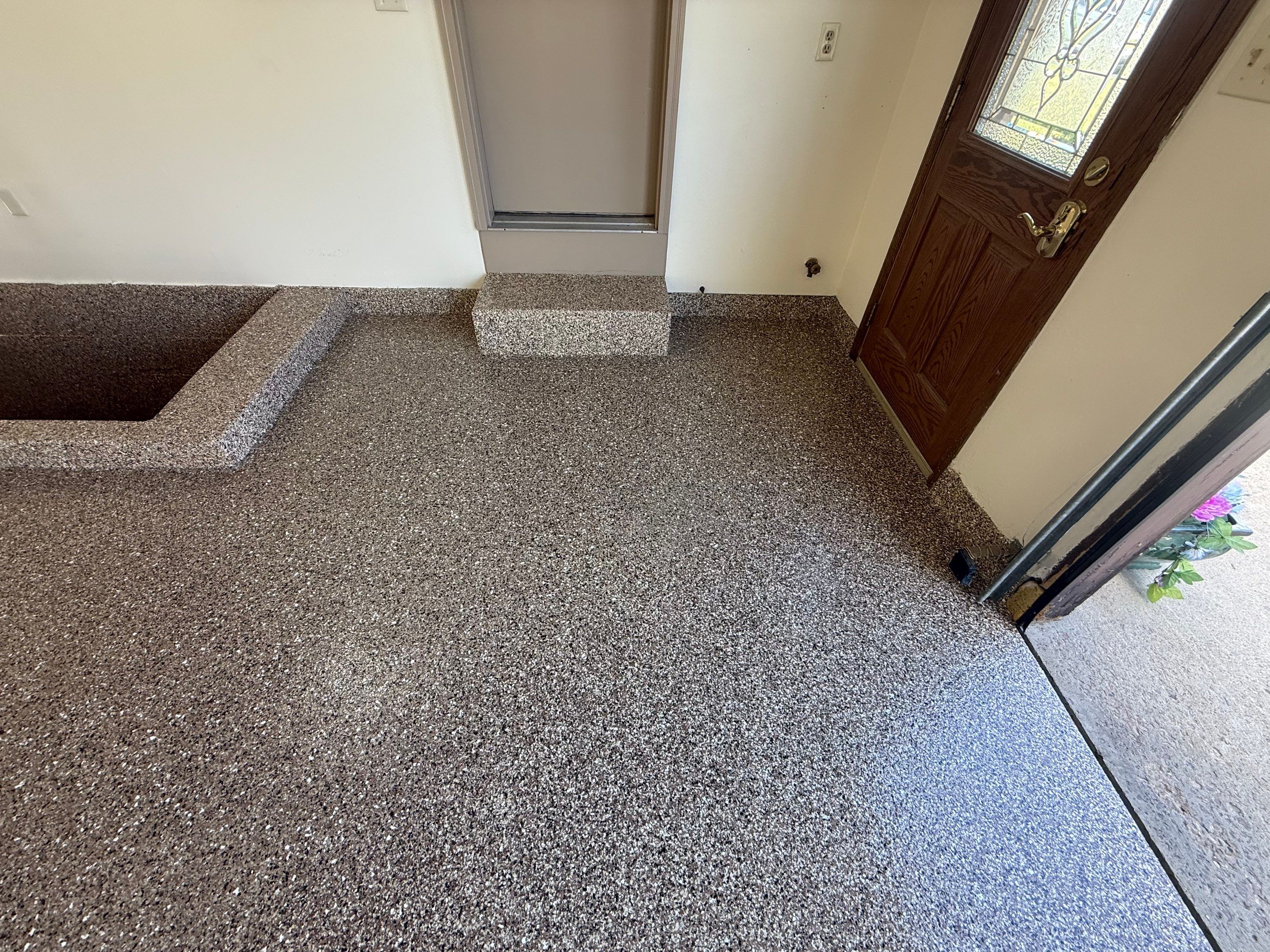 Custom Polyaspartic Garage Floor and Stairwell Coating in Pipestone by Select Painting, Coatings & Garage Cabinets