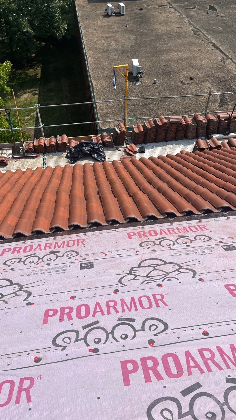 Commercial Roofing using  Ludowici Spanish 18 Clay Tile by Absolute Roofing and Construction